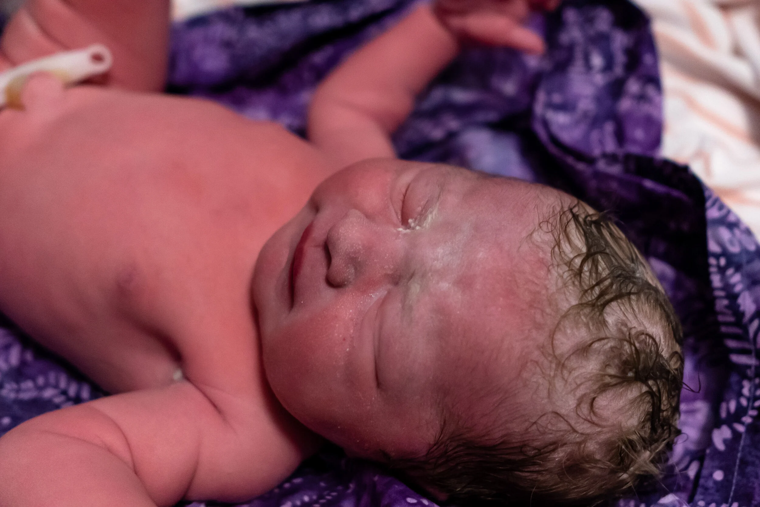 Birth Photography, birth stories, birth doula support and labor and delivery support by Randi Armstrong Birth and Creative Services in Grand Rapids, Michigan.