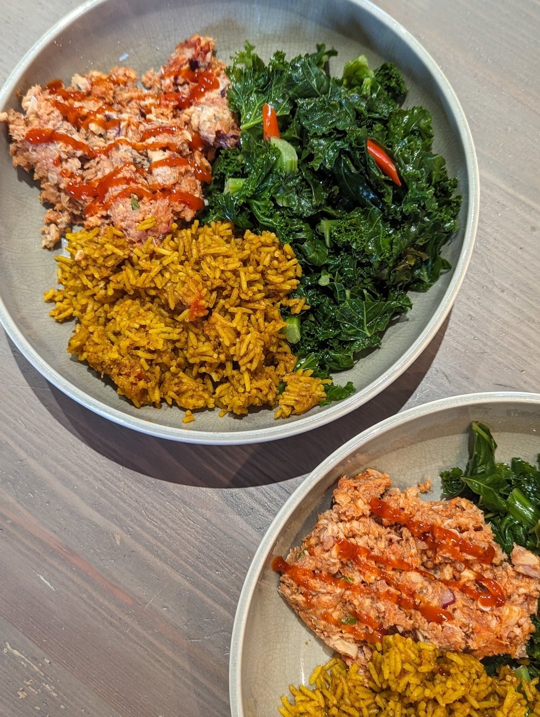 Welcome to another episode of &quot;Everything Here Is Processed&quot;.

Canned salmon with sriracha sauce, stir fried spicy kale and Aldi's piri piri microwaveable rice.

Delicious! 

#habits #eatwell  #nutritioncoaching #coaching #goodnutrition #ma