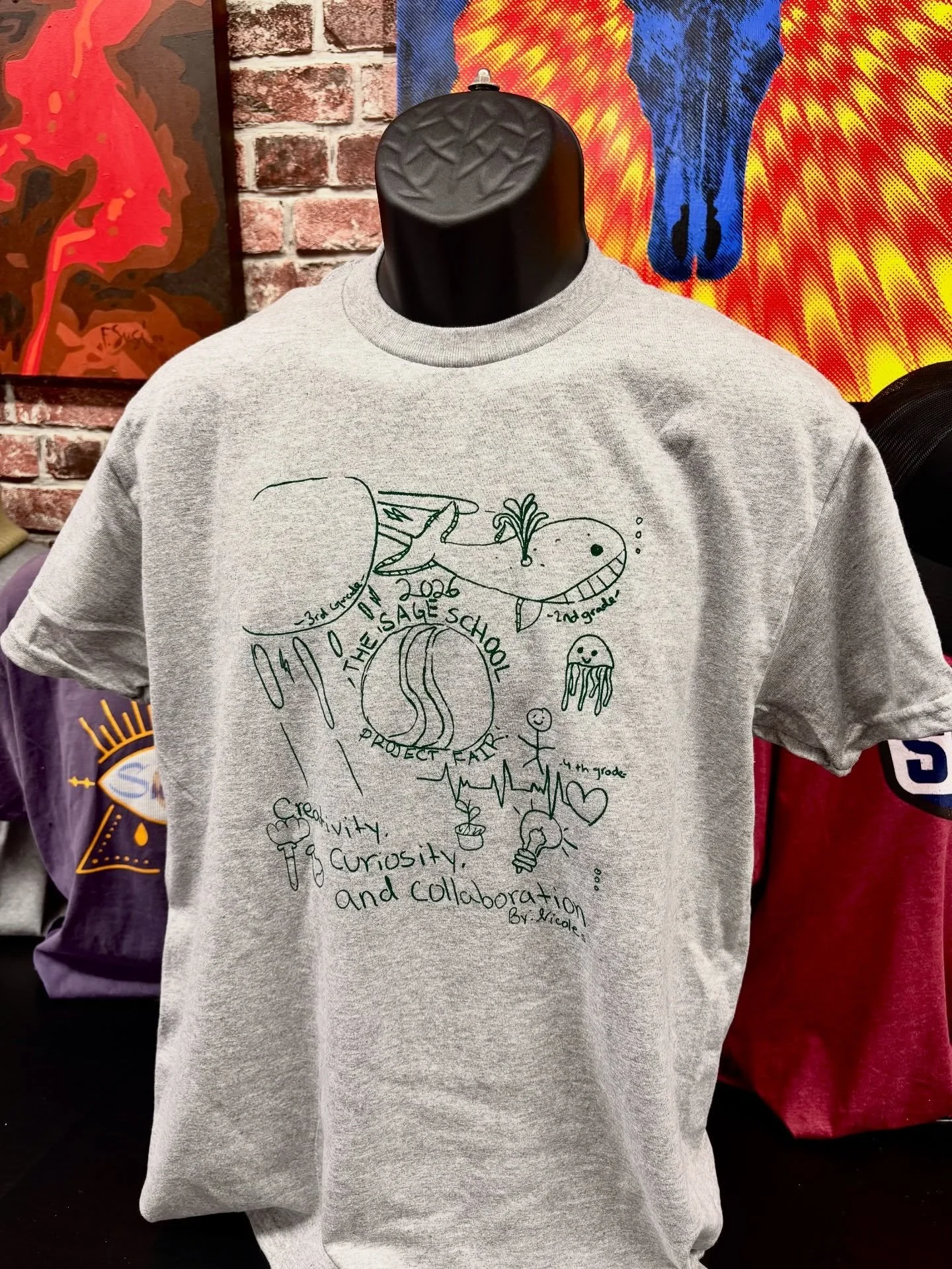 young creatives at work✍🏻
&bull;
turned this super cute drawing from a Sage School student into some inked tees 🤩
&bull;
&bull;
&bull;
#screenprinting #youngartist #shoplocal #supportsmallbusinesses #onestrokeinks