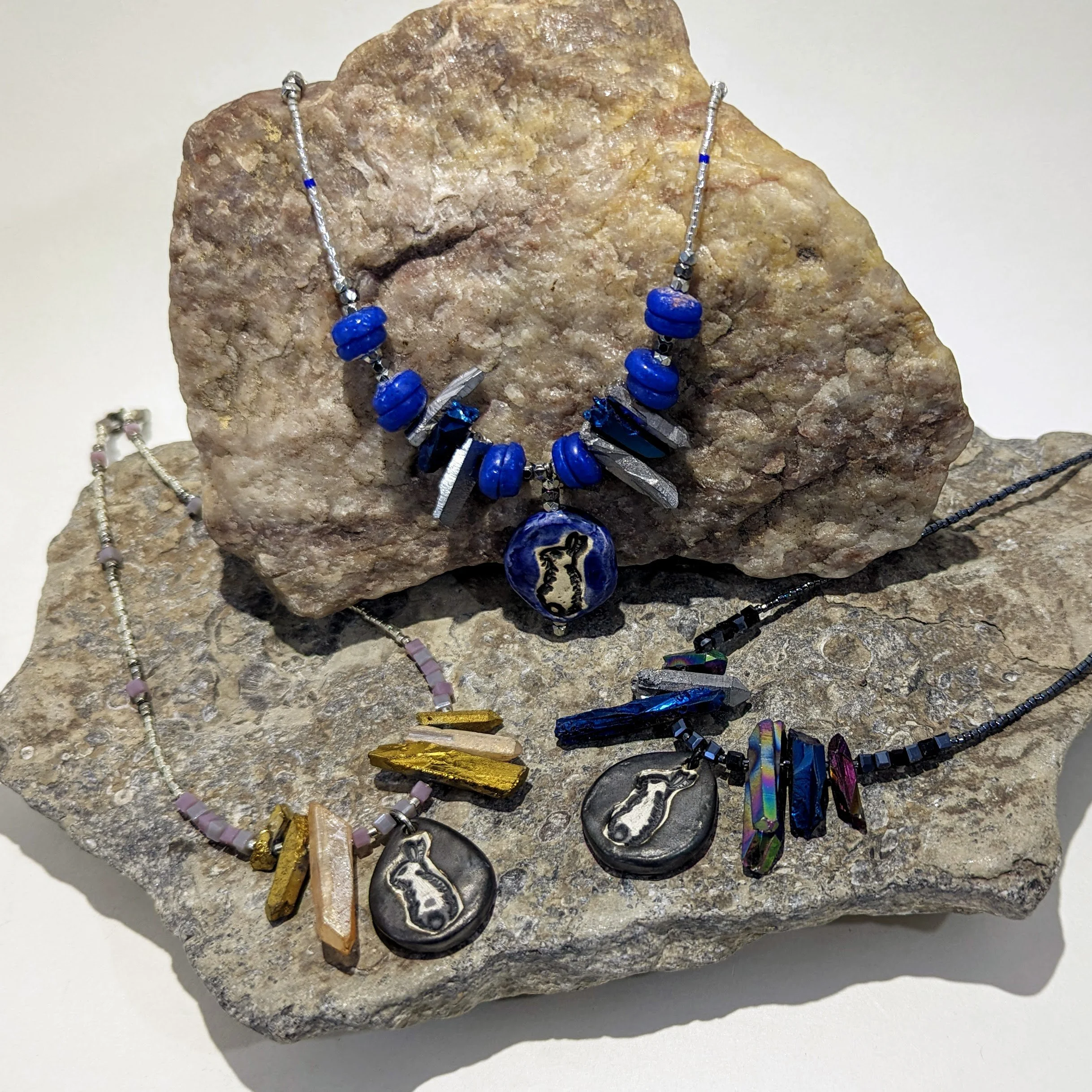 hare necklaces w/crystals