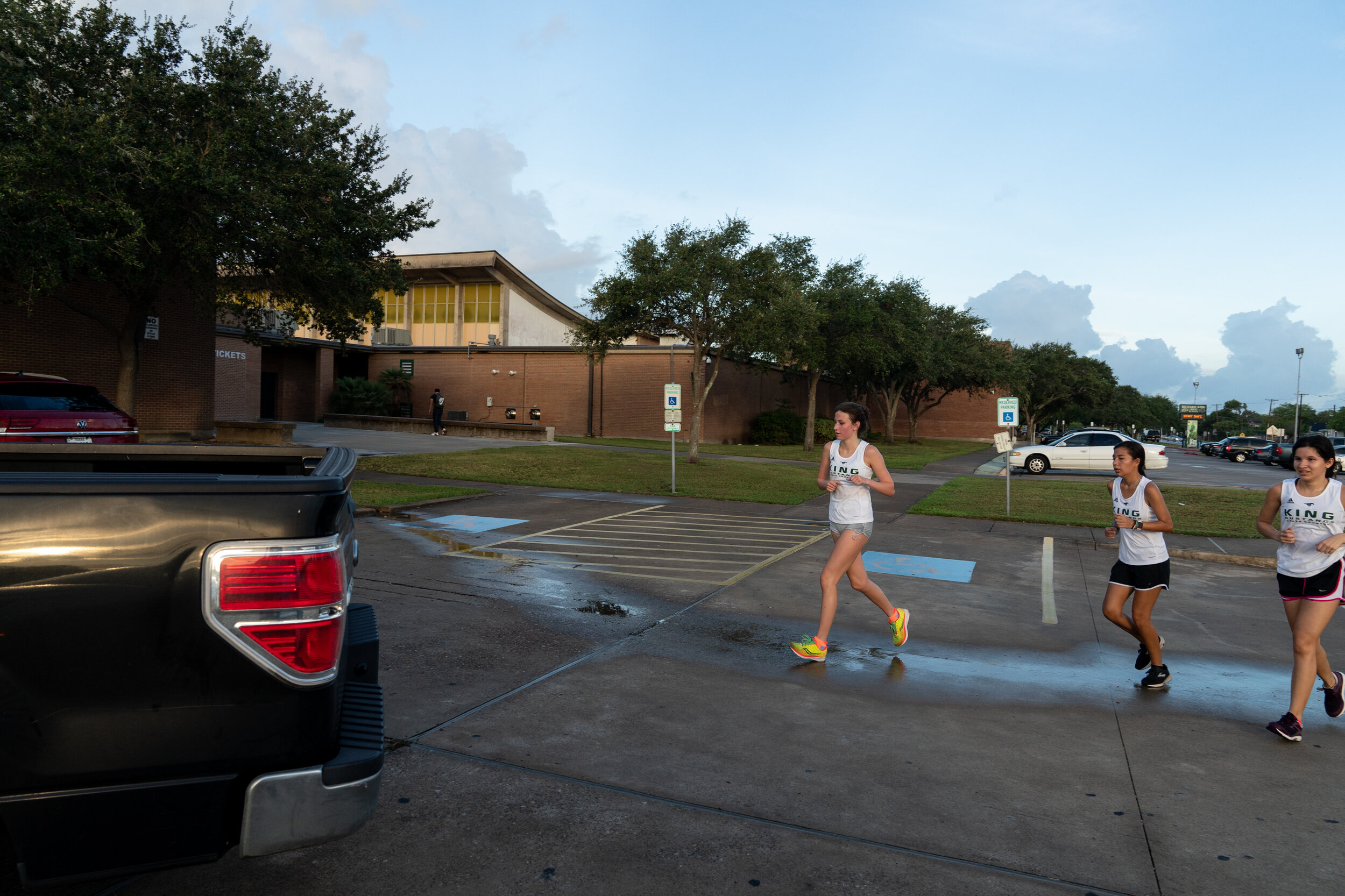  CORPUS CHRISTI, TEXAS - September 9, 2020: Ella and her track team practice in the early morning. 