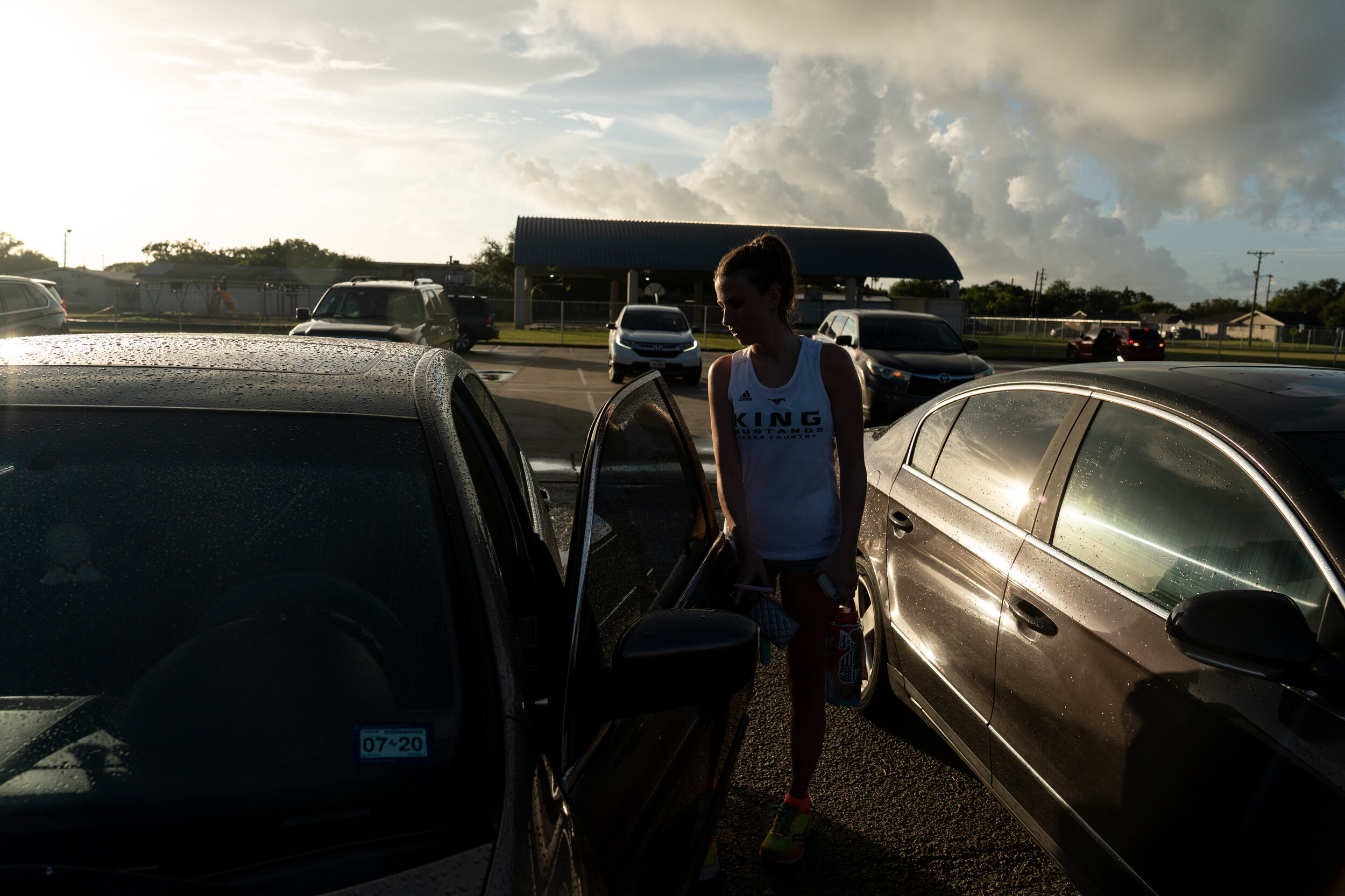  CORPUS CHRISTI, TEXAS - September 9, 2020: Ella Cole, 17, leaves Richard King High School to go home and shower and make breakfast before remote class begins. 