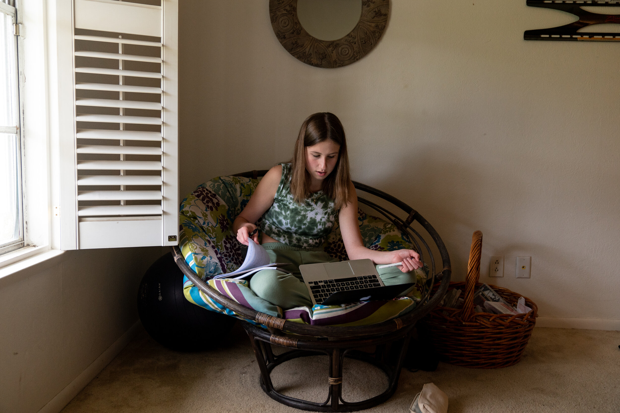  CORPUS CHRISTI, TEXAS - September 9, 2020: After running errands, Ella Cole, 17, settles in to do homework at home. 