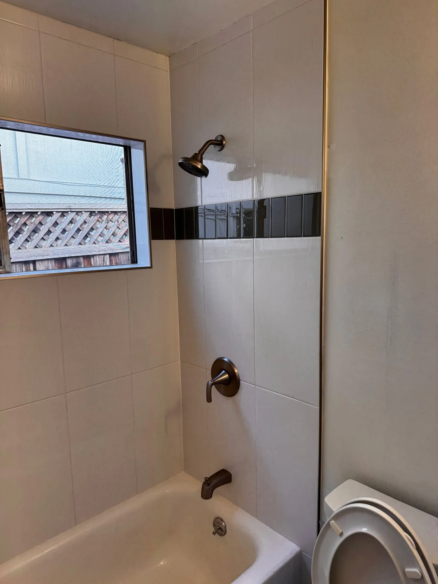 Contract Flooring's recent remodel of a bathroom in Redwood City, CA finished in only 4 days. Included new tile, new toilet, new vanity, and new floors.  #HomeImprovement  #remodel  #tilework