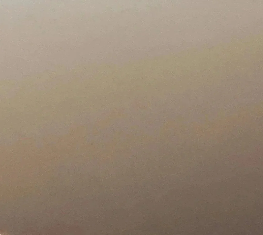 A plain, beige-colored surface with no distinct objects or features.