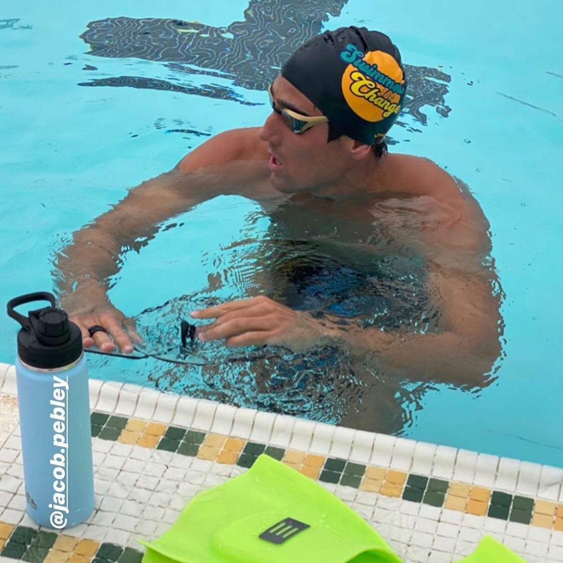 SPOTTED🤩 @jacob.pebley repping Swimmers For Change in and out of the pool this Saturday. Shoutout @finisswim for the sweet caps! #swim #swimmersforchange #blacklivesmatter #change #pool #olympians #tokyo2021