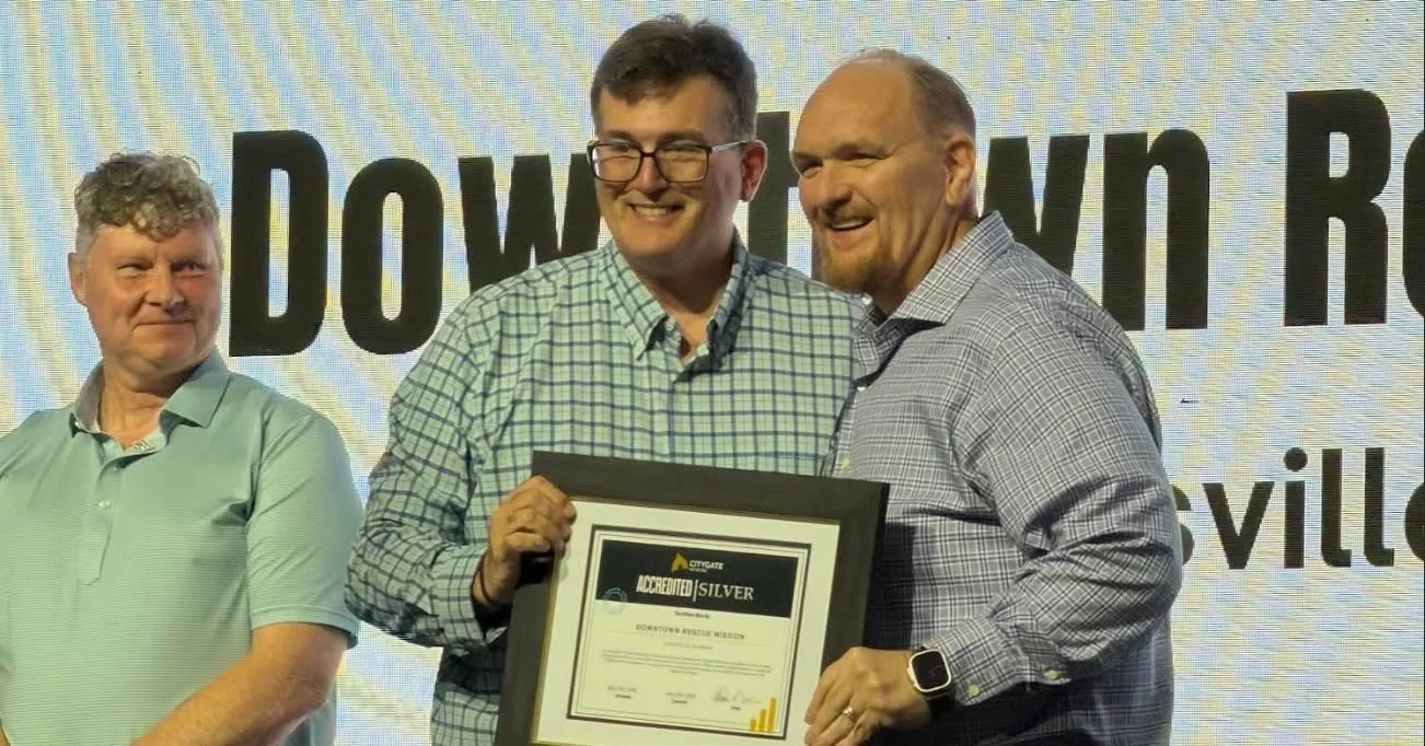 Keith accepting award.