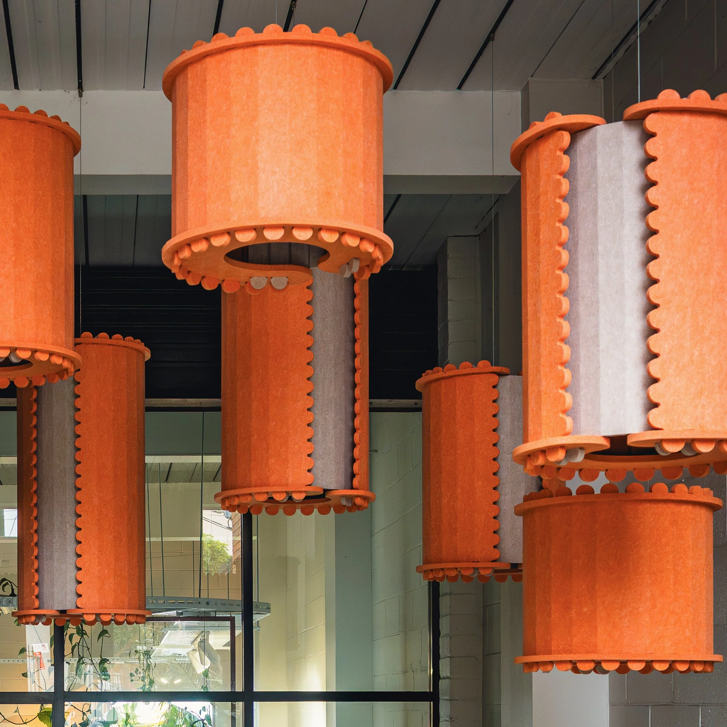 OM custom Orange baffle against mural (2).jpg