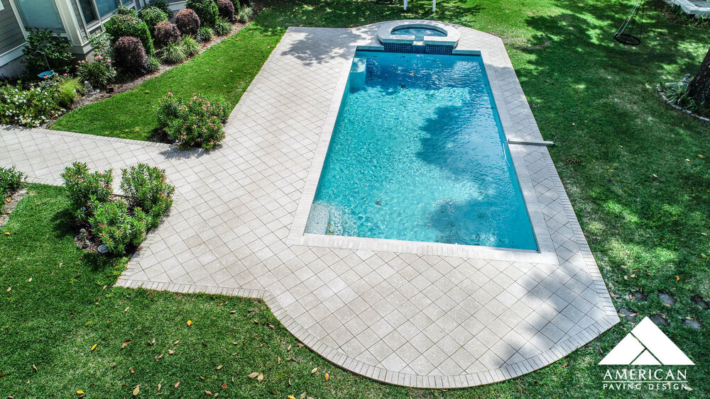 What is the best material to use on a pool deck? — American Paving Design