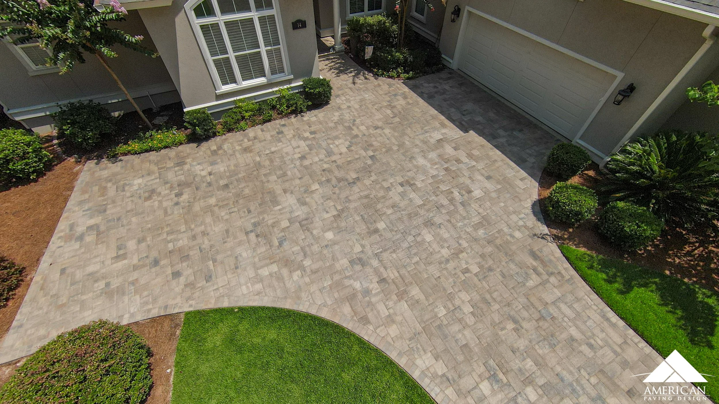 Driveway Drainage Problems: How Pavers Can Help Manage Water Around Your Home