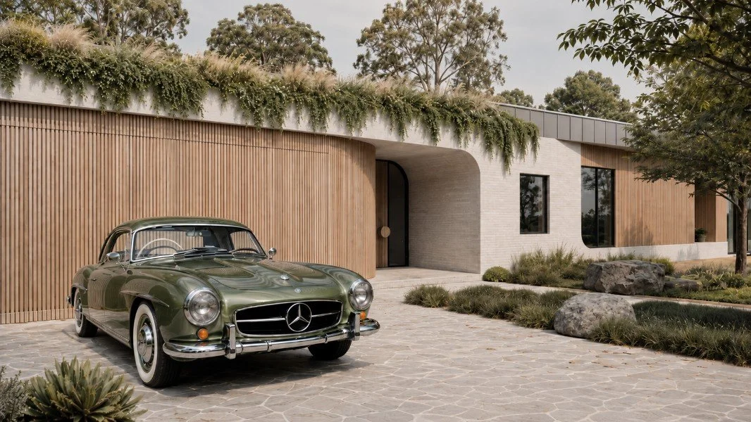 Estuary House in Mount Martha, featuring a curved timber garage façade, pale brickwork, integrated rooftop planting and a landscaped stone driveway with a classic Mercedes-Benz.