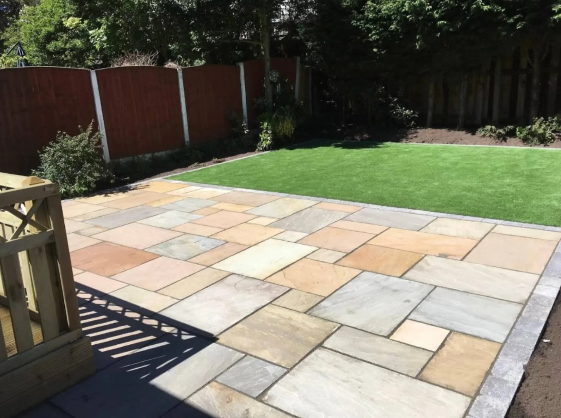 sandstone-patio-new-turf-garden.jpg