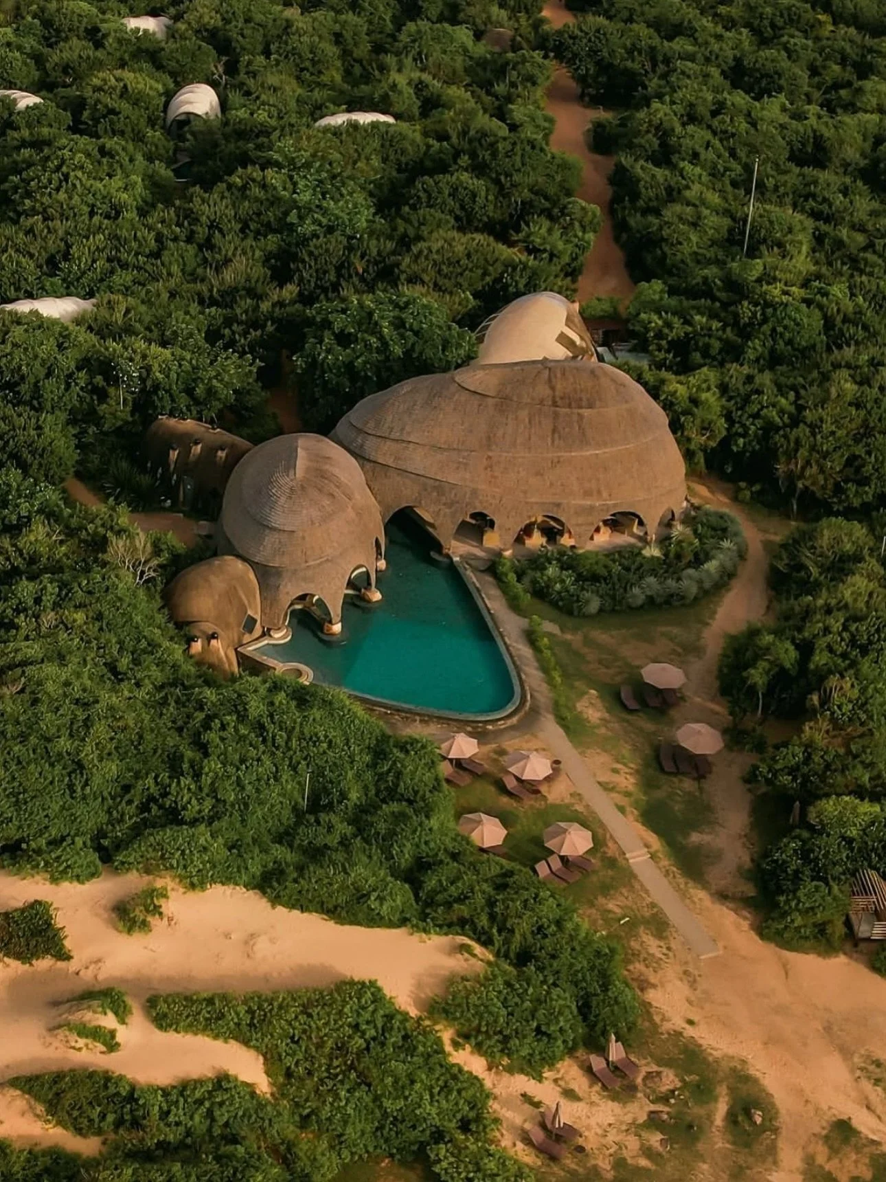 Where the edge of Yala National Park meets the Indian Ocean, @wildcoastlodge sits in perfect balance &mdash; between wilderness and design, adventure and calm. The cocoon-shaped tents echo the curves of the surrounding boulders, blending quietly into