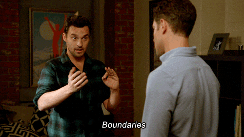 Nick from New Girl is forming a line with his hands in front of Schmidt. He says "Boundaries".