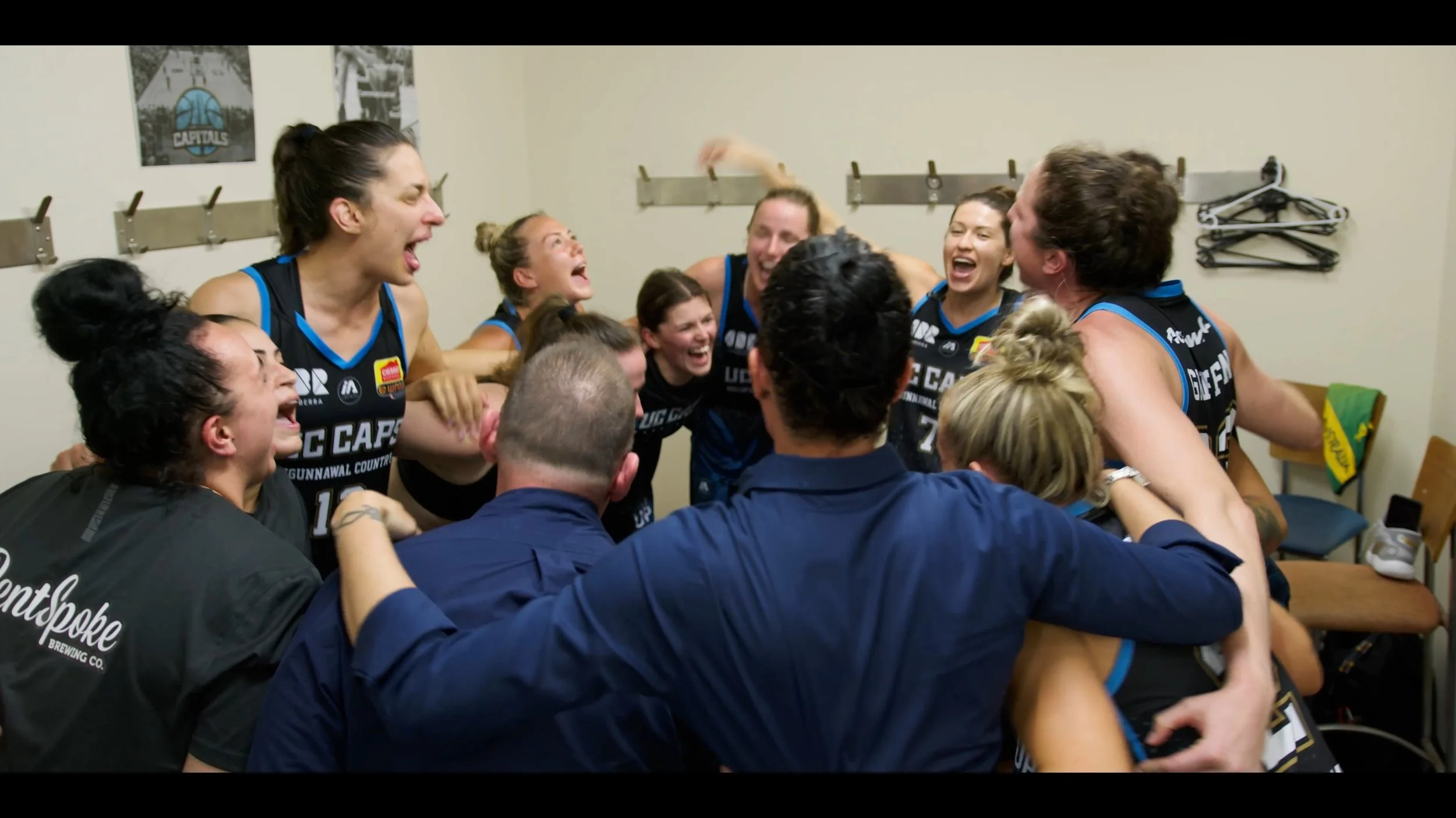 Go Big - Locker Room Huddle 1.jpg
