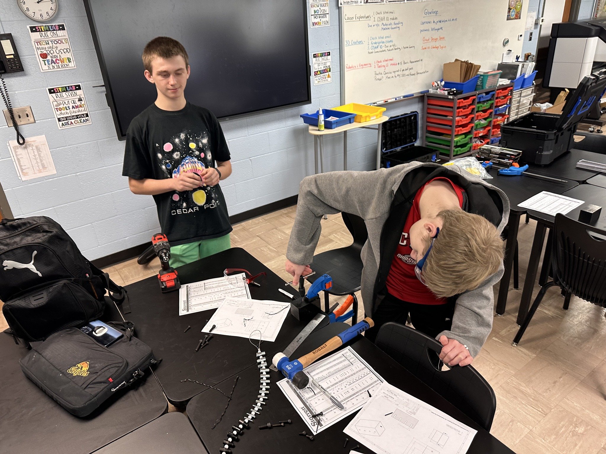 AOMC instructors recently taught a drilling and tapping lab at Belpre High School's Robotics and Engineering class. The students learned how to identify different thread types, and then how to properly drill and tap a hole.

AOMC instructors present: