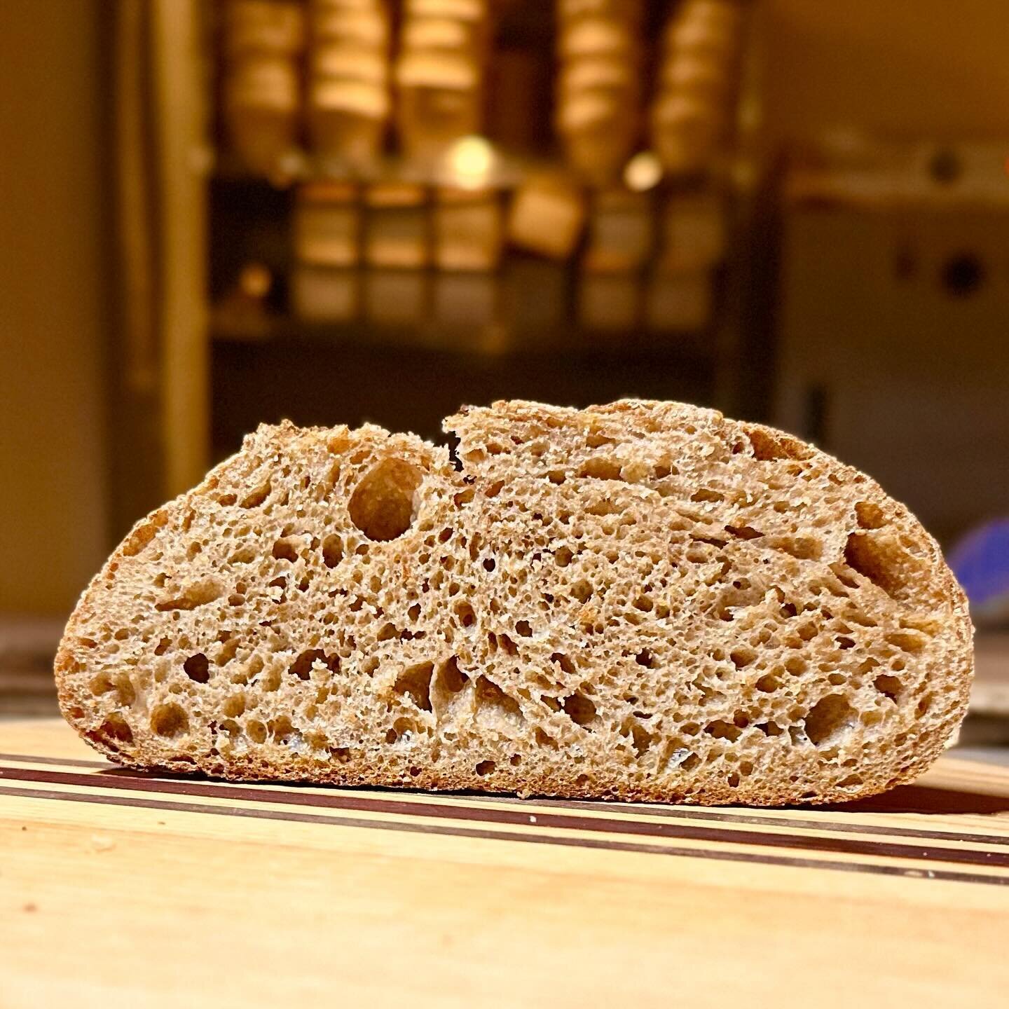 A peek inside our 100% whole wheat loaf. Made with only three ingredients - stone ground wheat flour from @cvmllc, water, and sea salt. It&rsquo;s hearty, gut-friendly, and ready to pair with your favorite winter dishes! 

Compare the ingredients to 