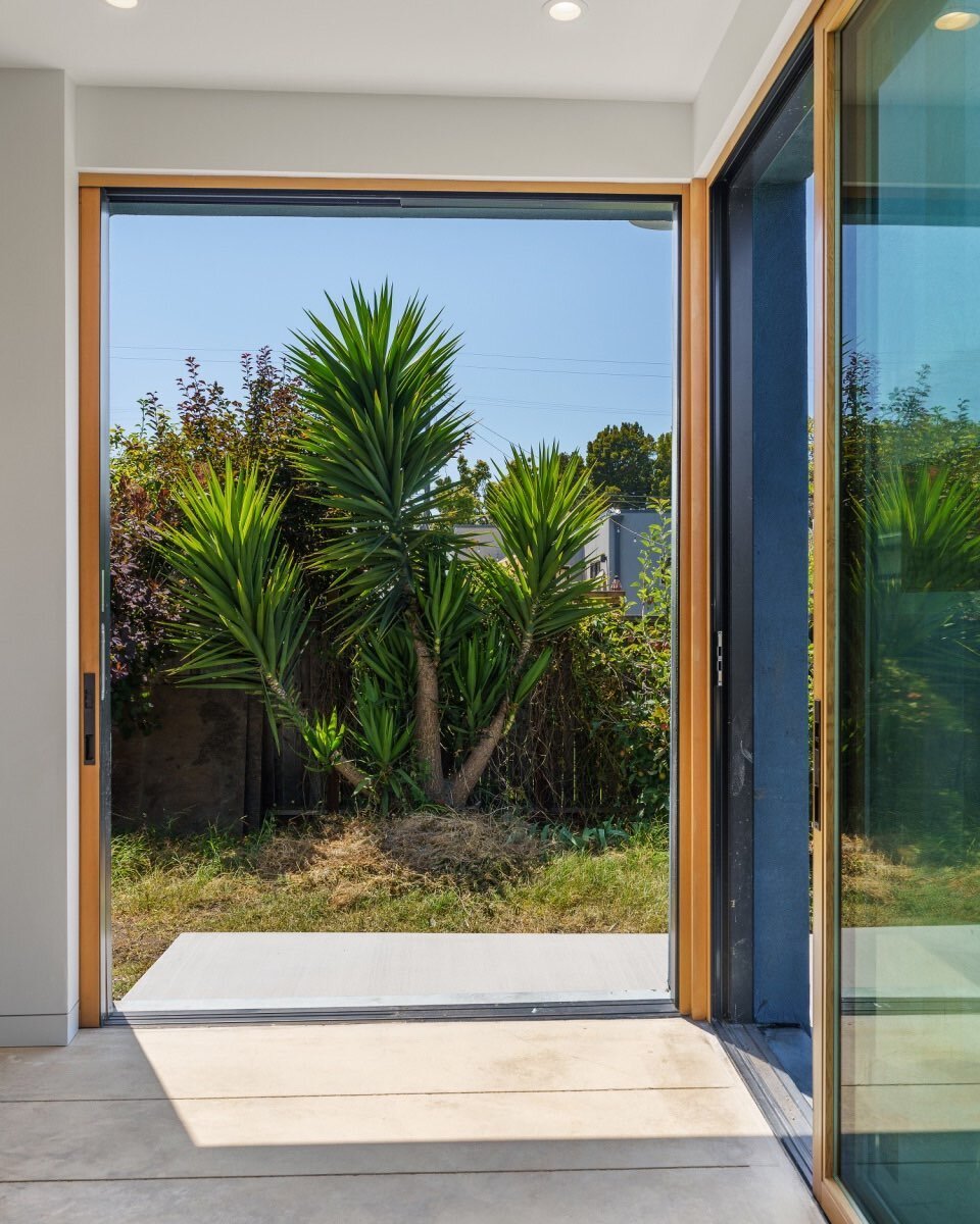 Telescoping doors to a private little yard on our 10th Street Berkeley project.  Just wait until the actual patio is there.