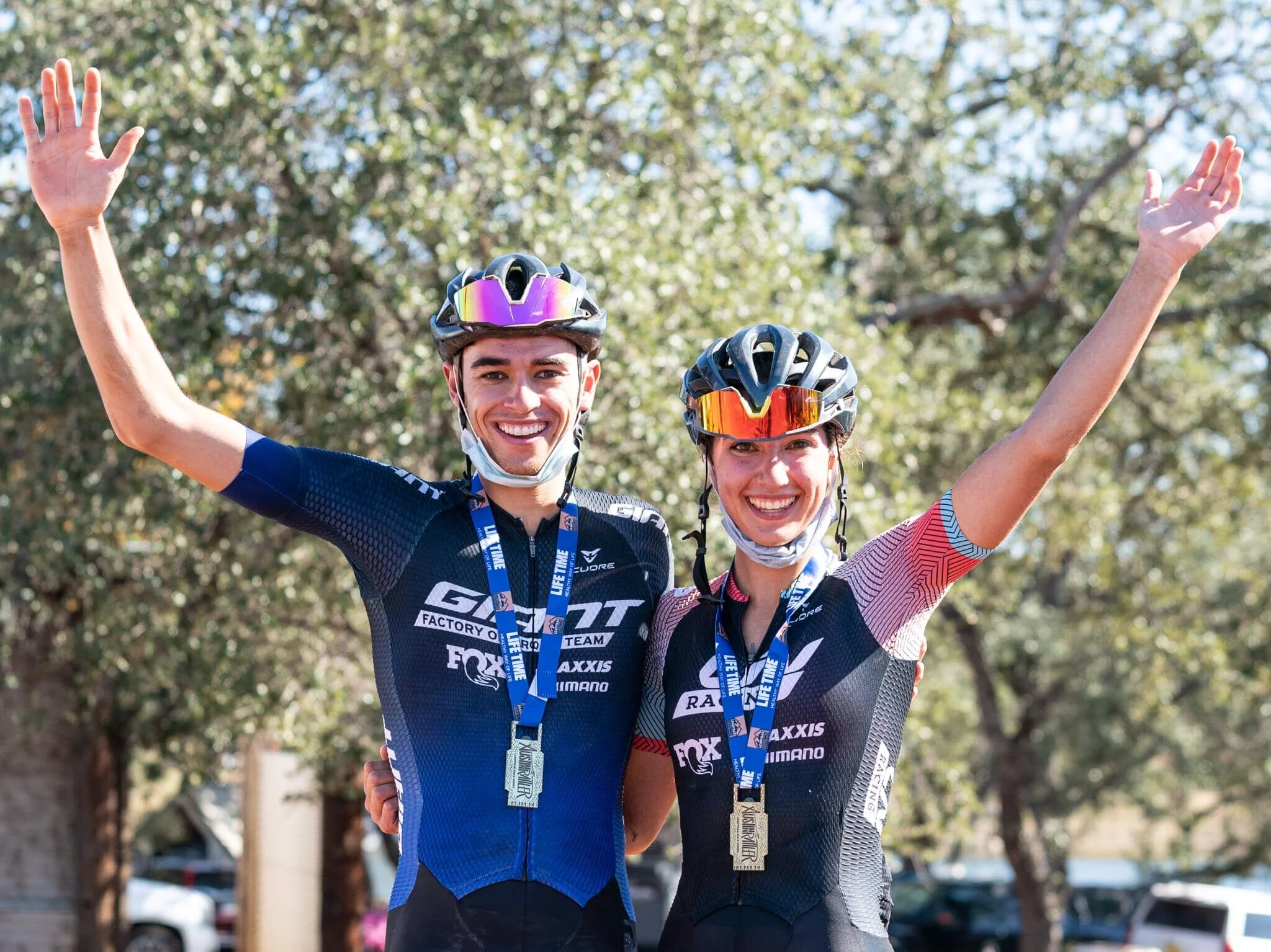 two-professional-mountain-bike-athletes-on-podium