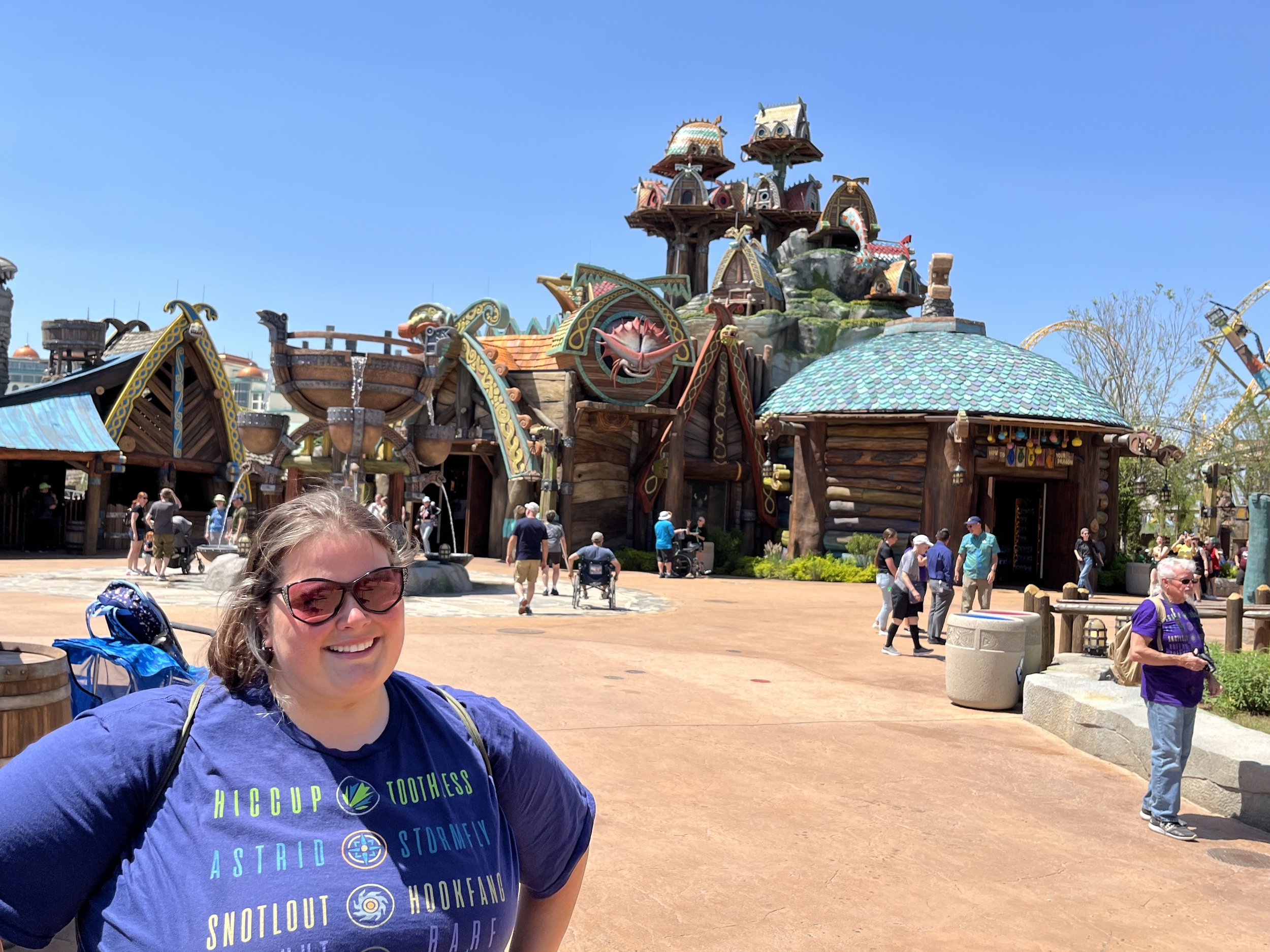 Mainland Retail Designer, Amber Vaughn, in front of the Mainland Retail (How to Treat Your Dragon / Viking Traders) at Isle of Berk.