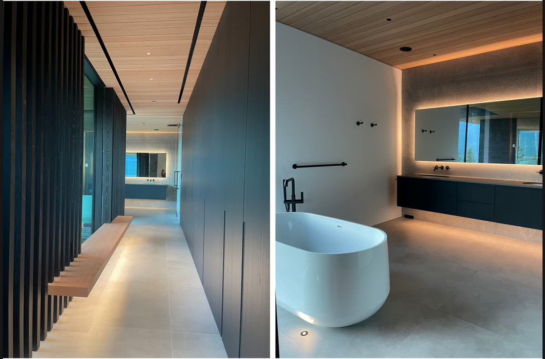 Modern interior with a hallway on the left and a bathroom with a bathtub on the right, featuring minimalist design, wooden ceiling, and sleek finishes.