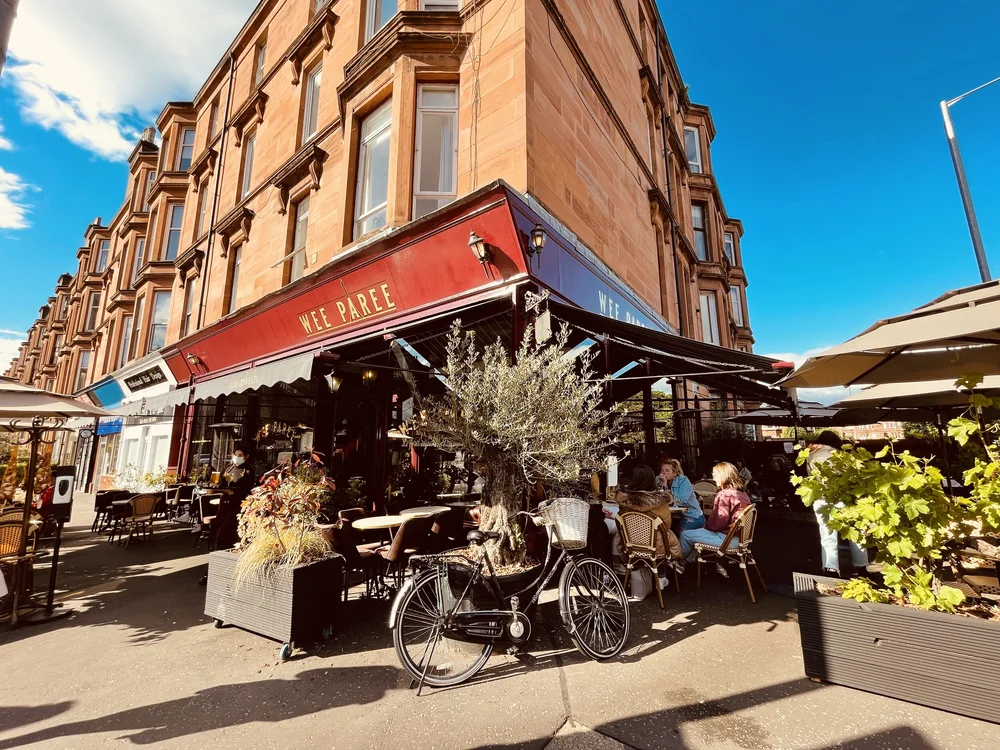 Places to Eat Near Glasgow's Big Venues: Scotstoun, Hampden, the Hydro and More 4 The red frontage and pavement tables of Wee Paree on Crow Road