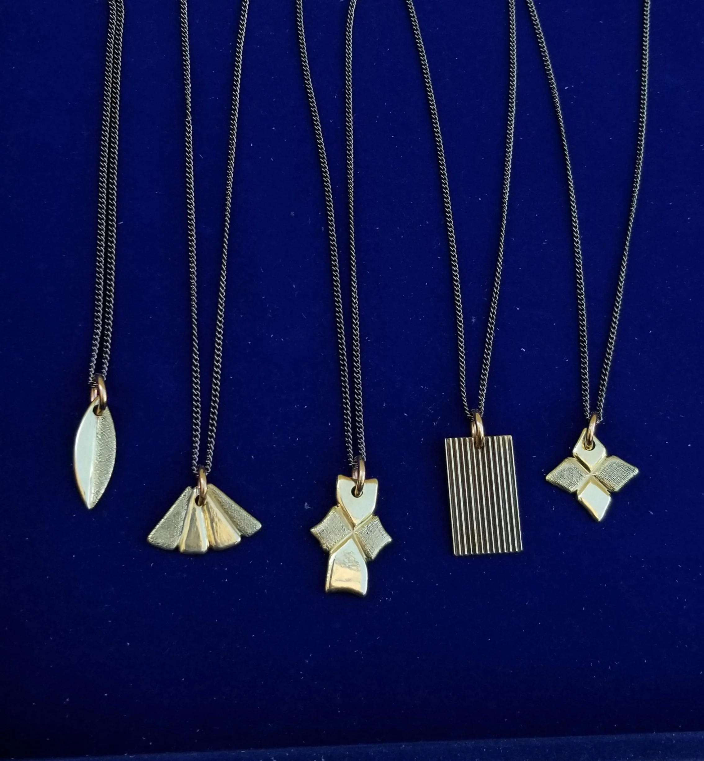 Carved  Brass  Pendant Necklaces