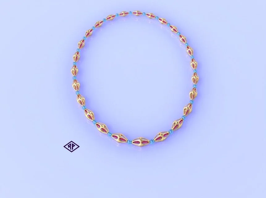 Necklace - Rubies Encased in Gold and Accented by Aquamarine