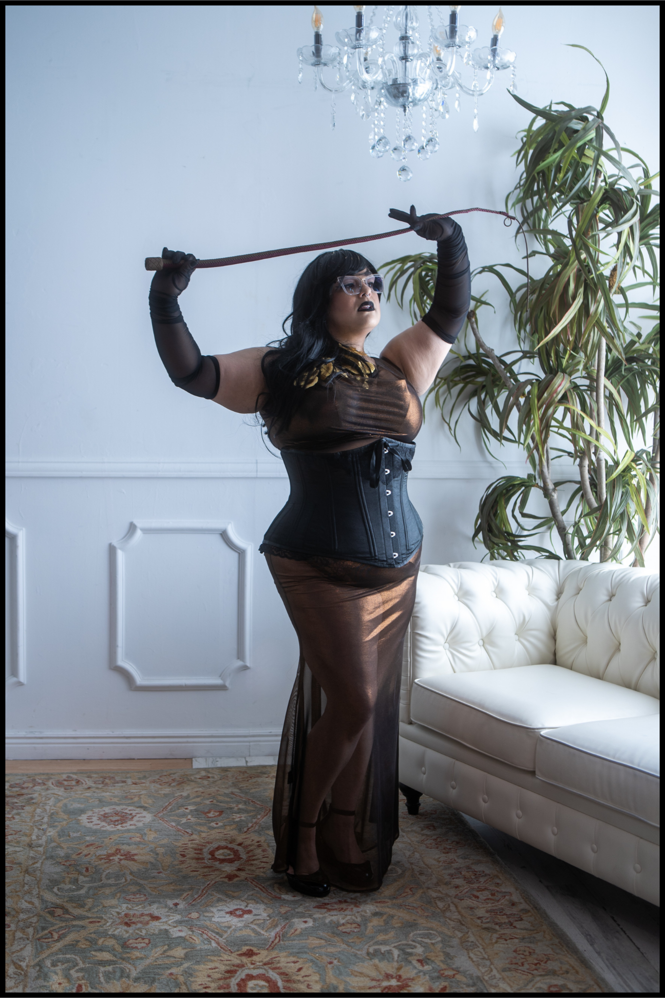 Pro Domme Madame Mona in Minneapolis using bullwhip