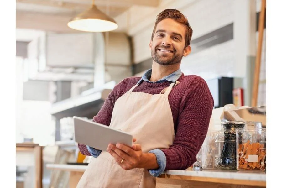 commercial business owner smiling after successful upgrades