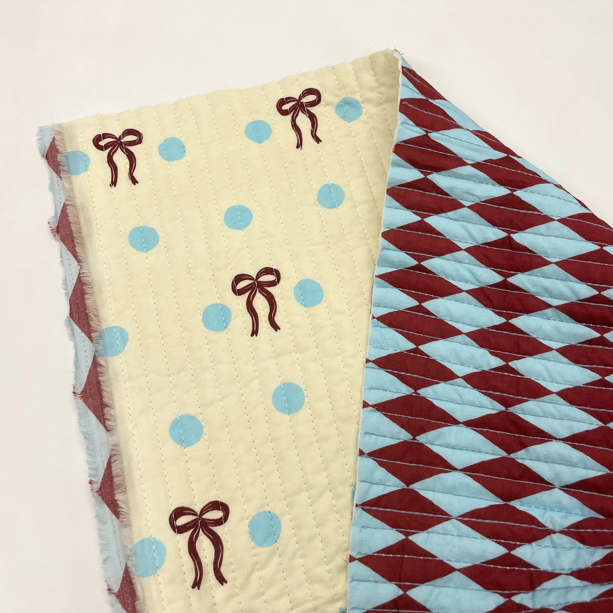 Hey Sew Sister - Exclusive Design - Bow Dot Harlequin Print Burgundy and Blue Quilted Cotton Fabric 2.jpeg