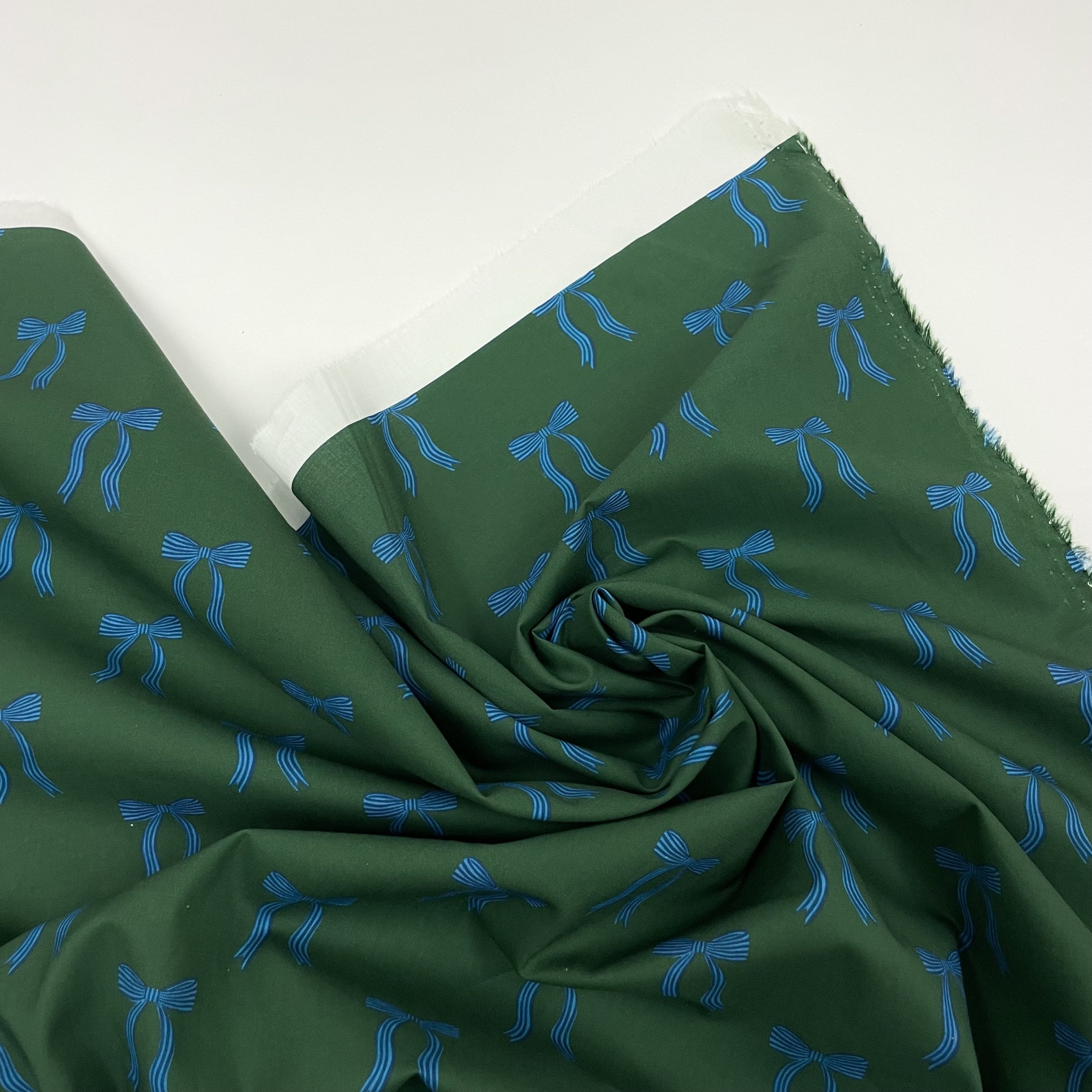 Hey Sew Sister - Pigeon Wishes - Adorn You - Bow Print Fabric - Cotton Lawn Poplin Dressmaking Fabric - Green and Blue - Leaf 3.jpeg