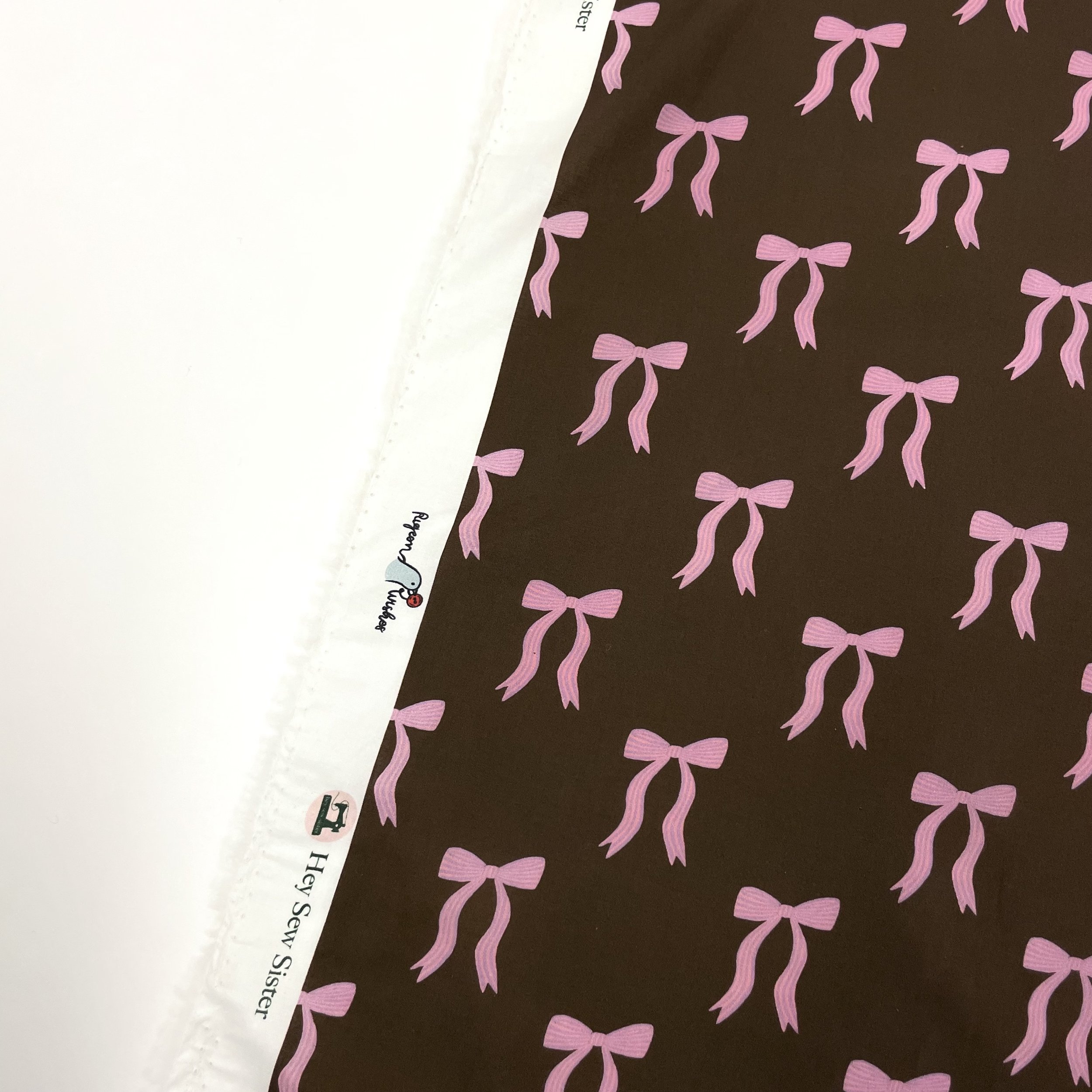 Hey Sew Sister - Pigeon Wishes - Adorn You - Bow Print Fabric - Cotton Lawn Poplin Dressmaking Fabric - Pink and Brown - Gingerbread 1.jpeg