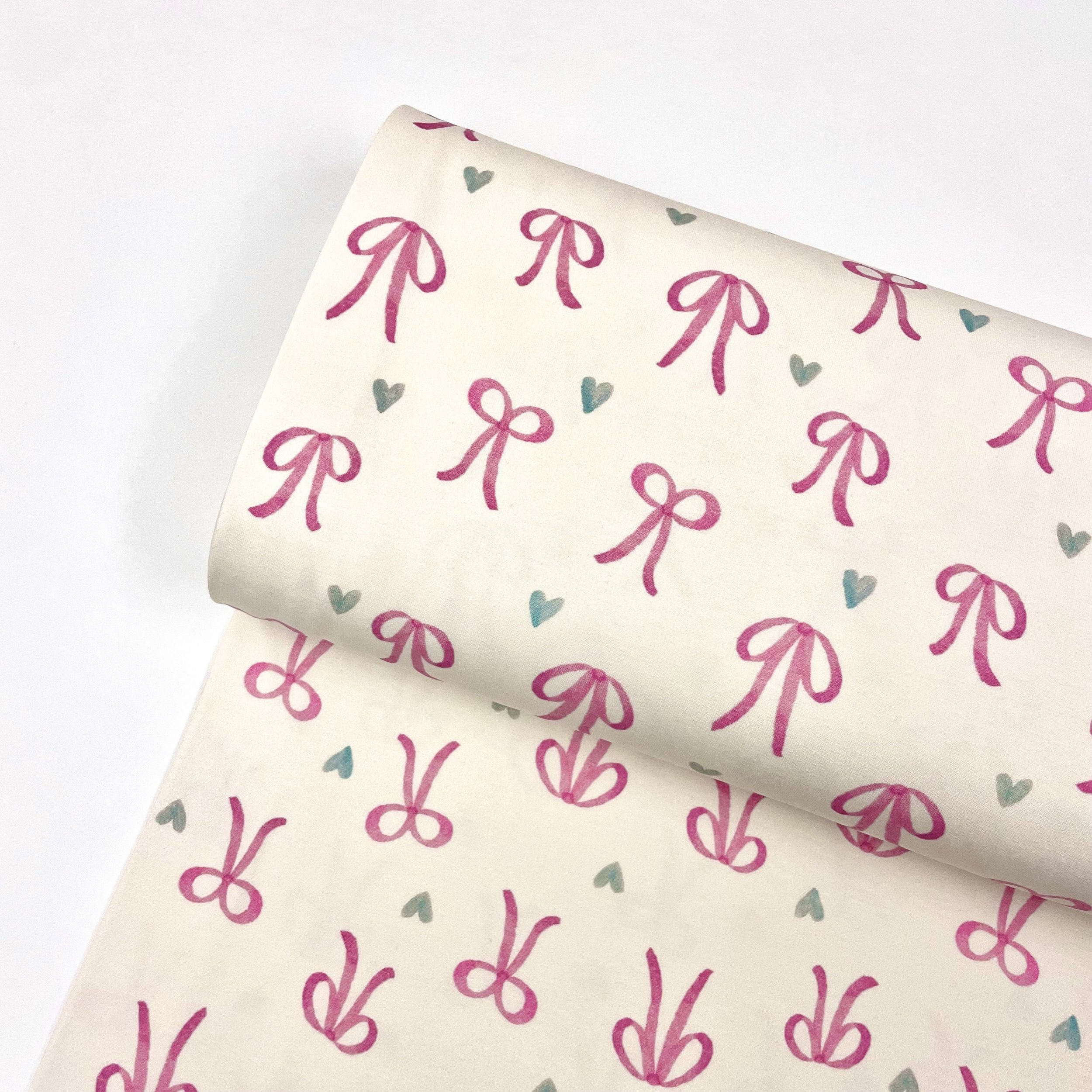 Hey Sew Sister - Bows and Hearts - Printed Super Soft Lightweight Sweatshirting Fabric - Cream and Pink 1.jpeg