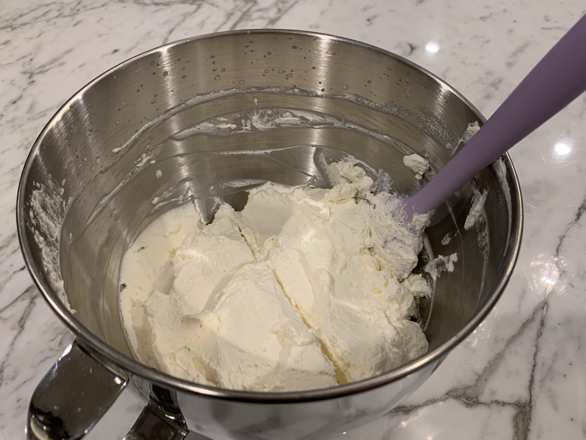 5a) Cut whipped cream in half.