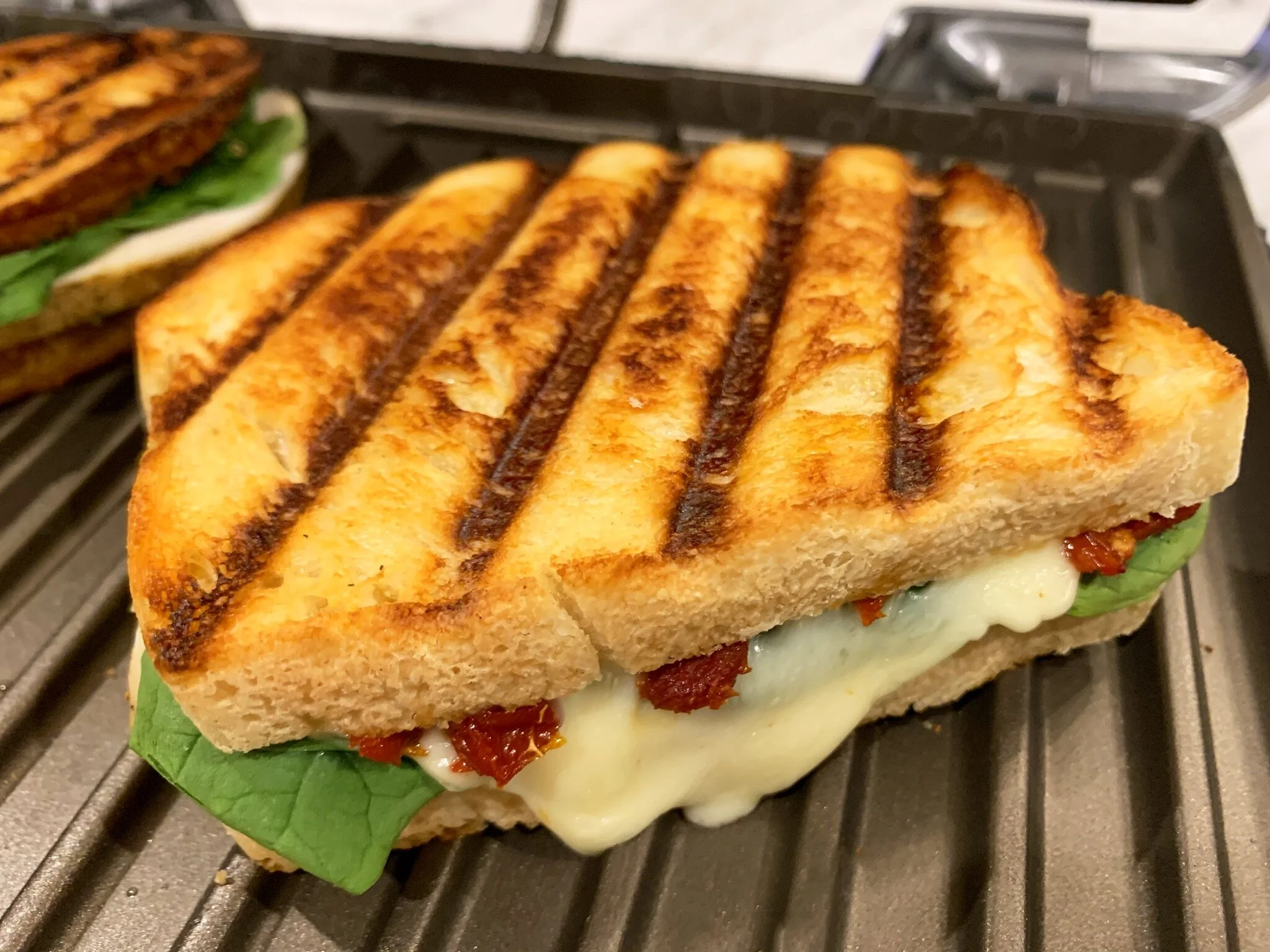a) Is cheese melted?