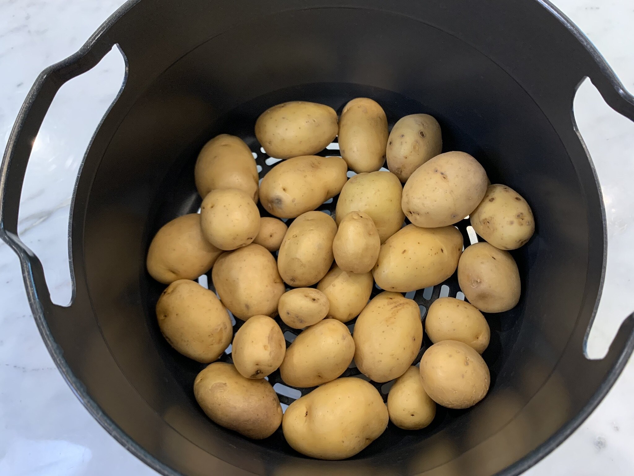 b) Potatoes in basket.