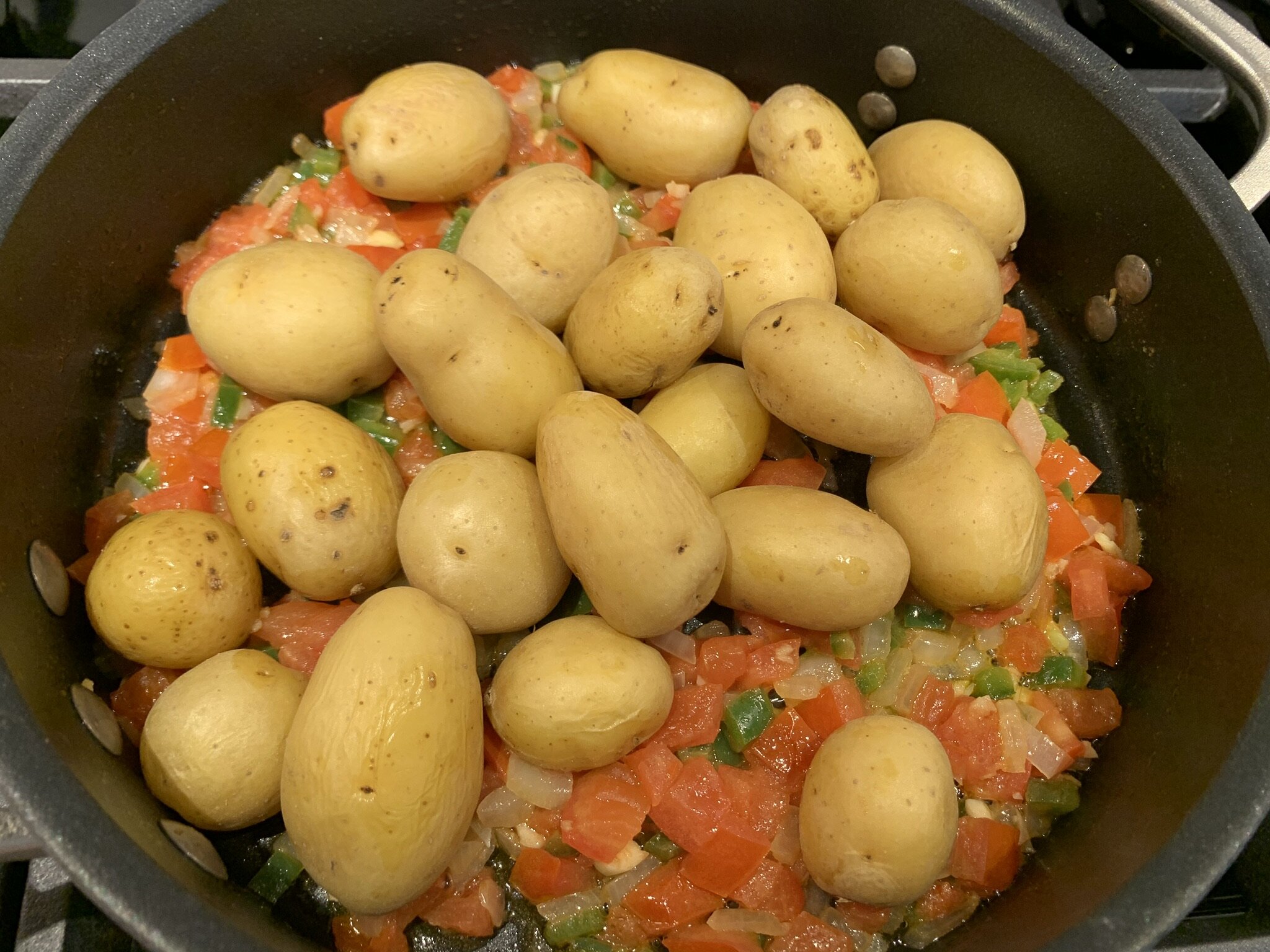 a) Add steamed potatoes. 