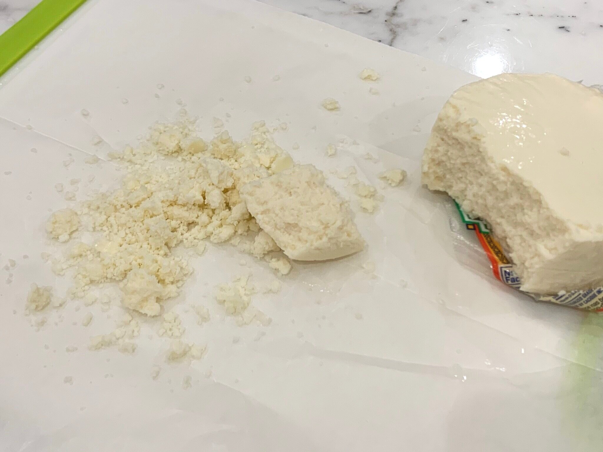 b) Crumble Cotija cheese.