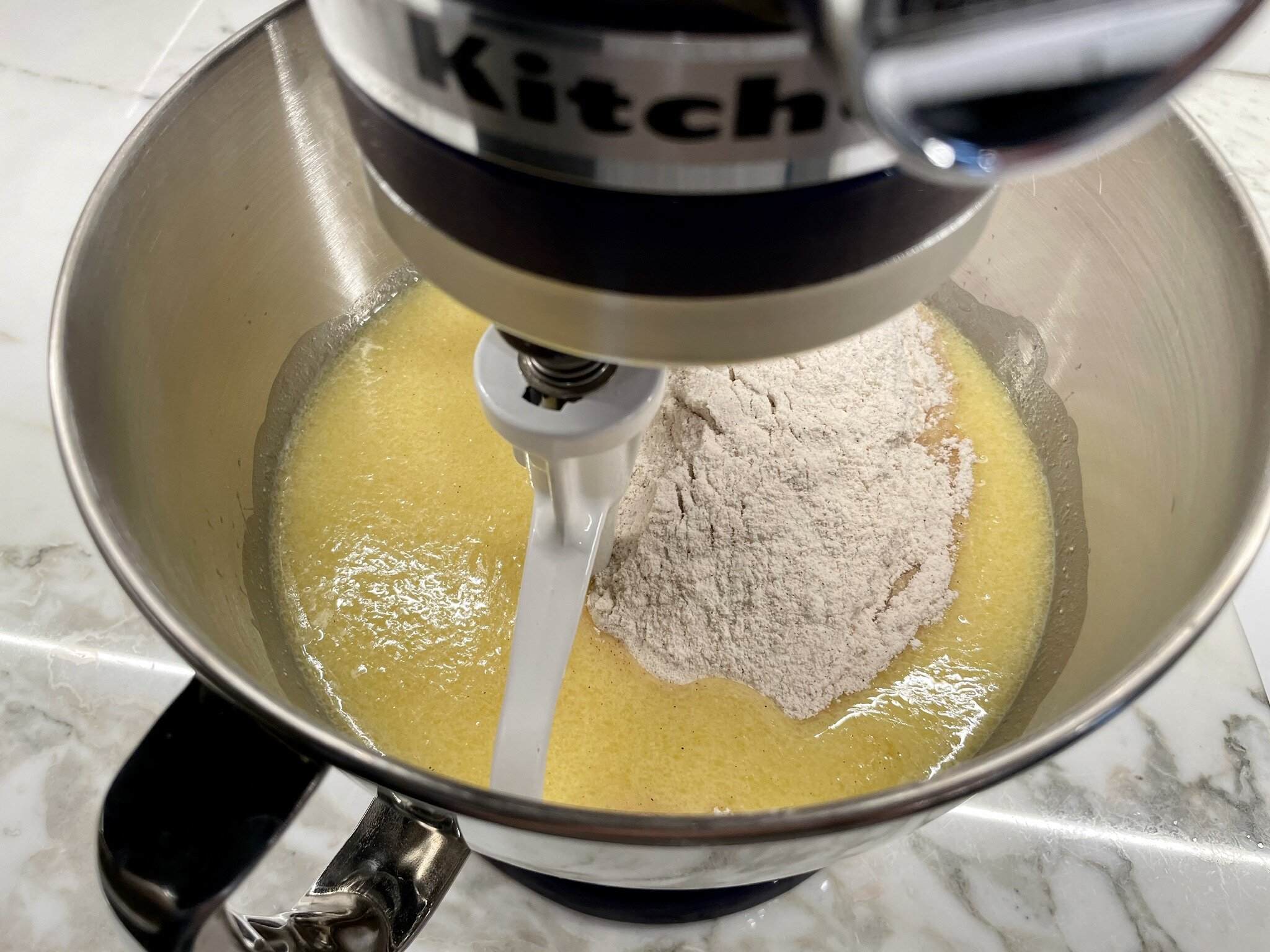 Chai Spice Bundt Cake add flour to mixer.jpg