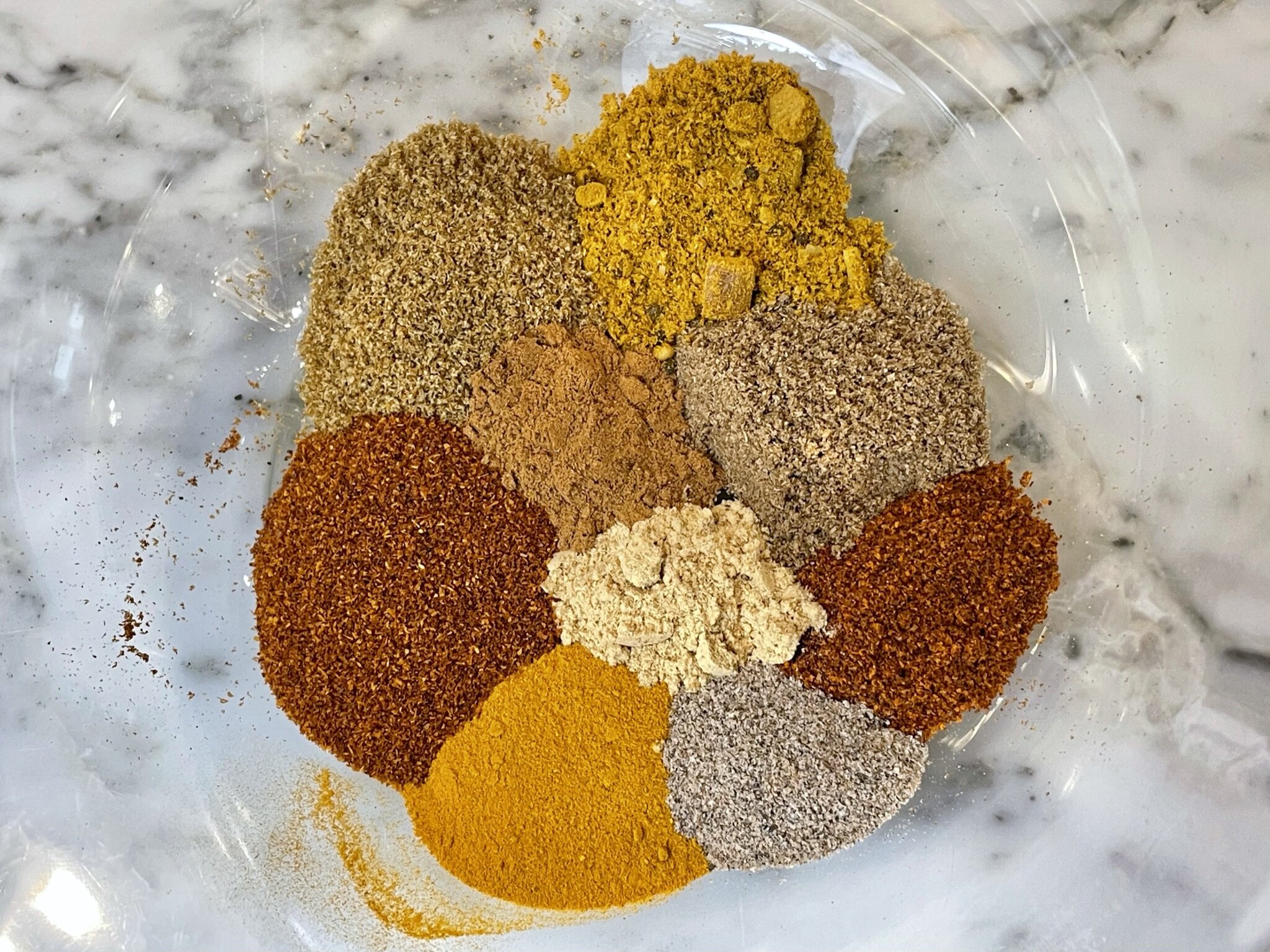 a) Add sauce spices to bowl.