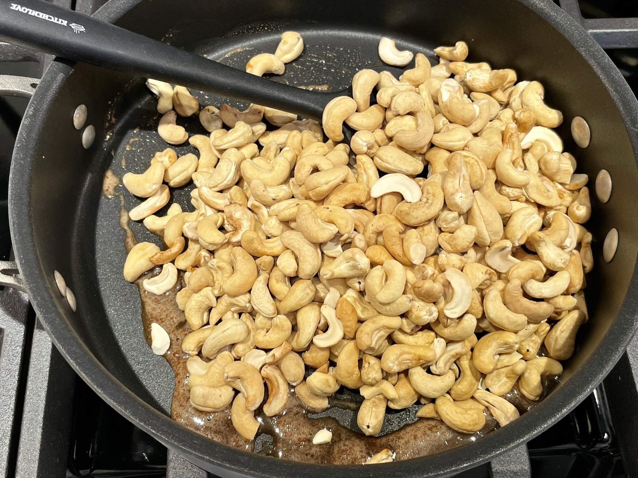 a) Add cashews.