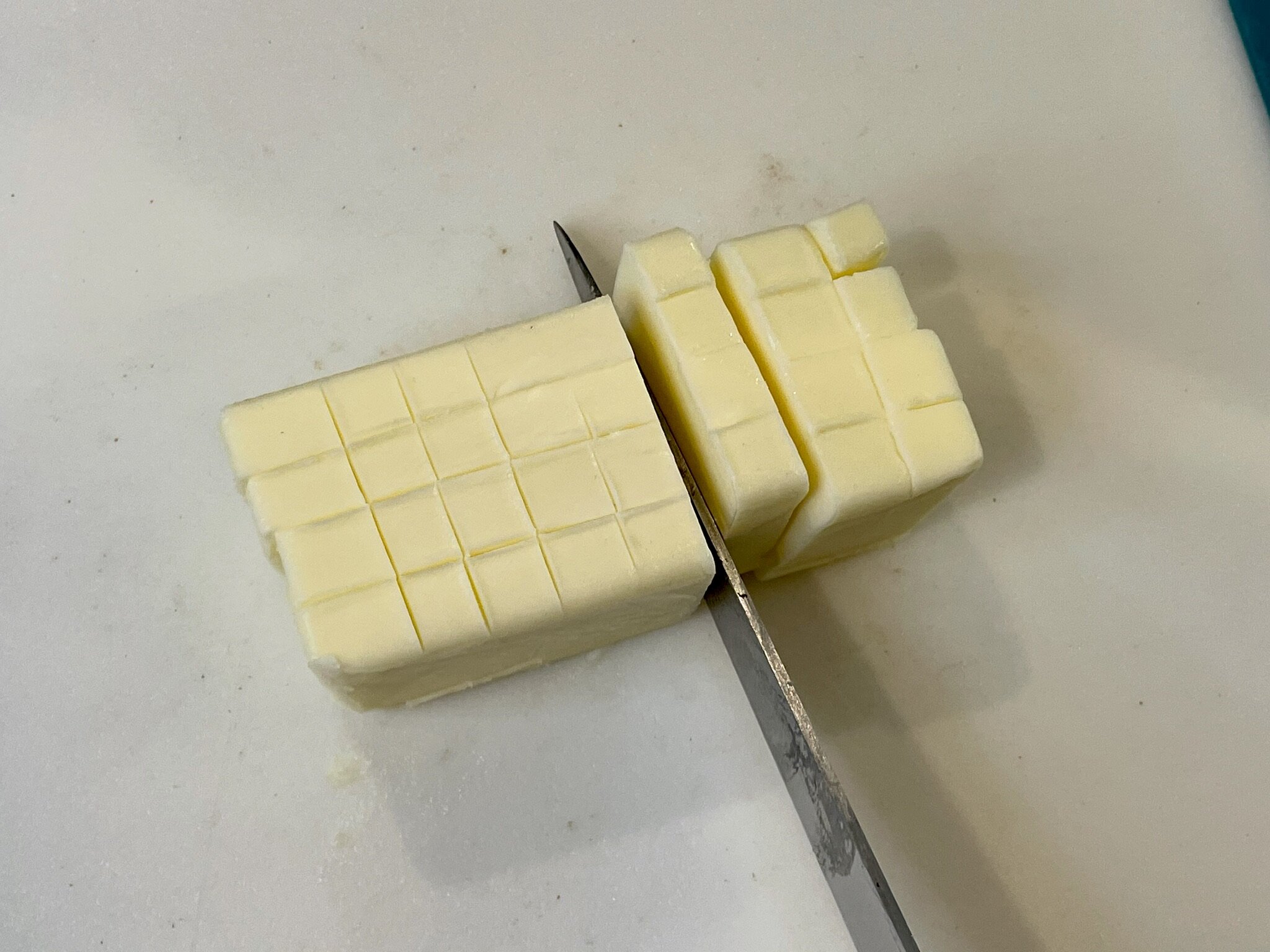 Cut butter into small cubes.
