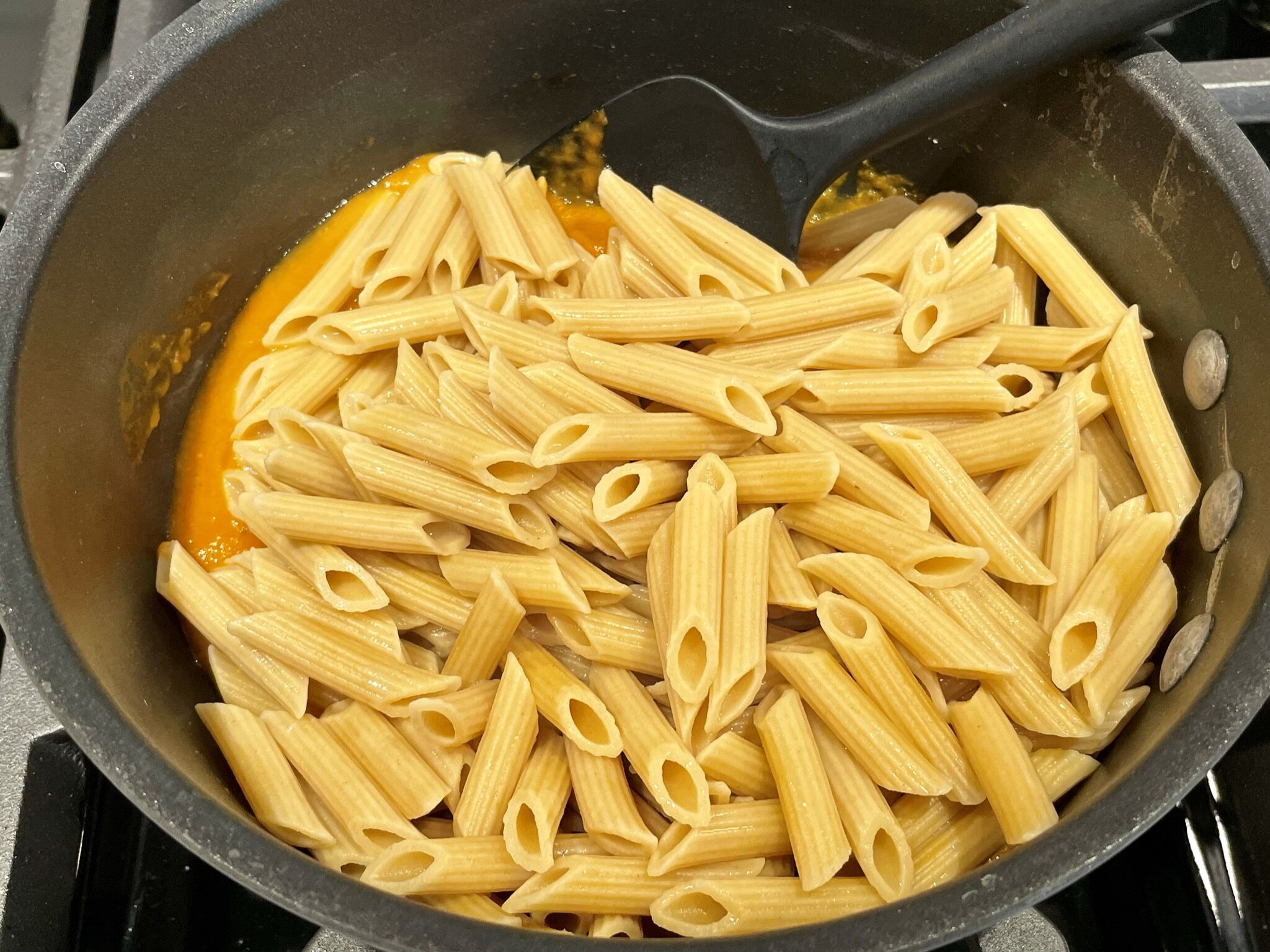 Add pasta, liquid &amp; cheese.