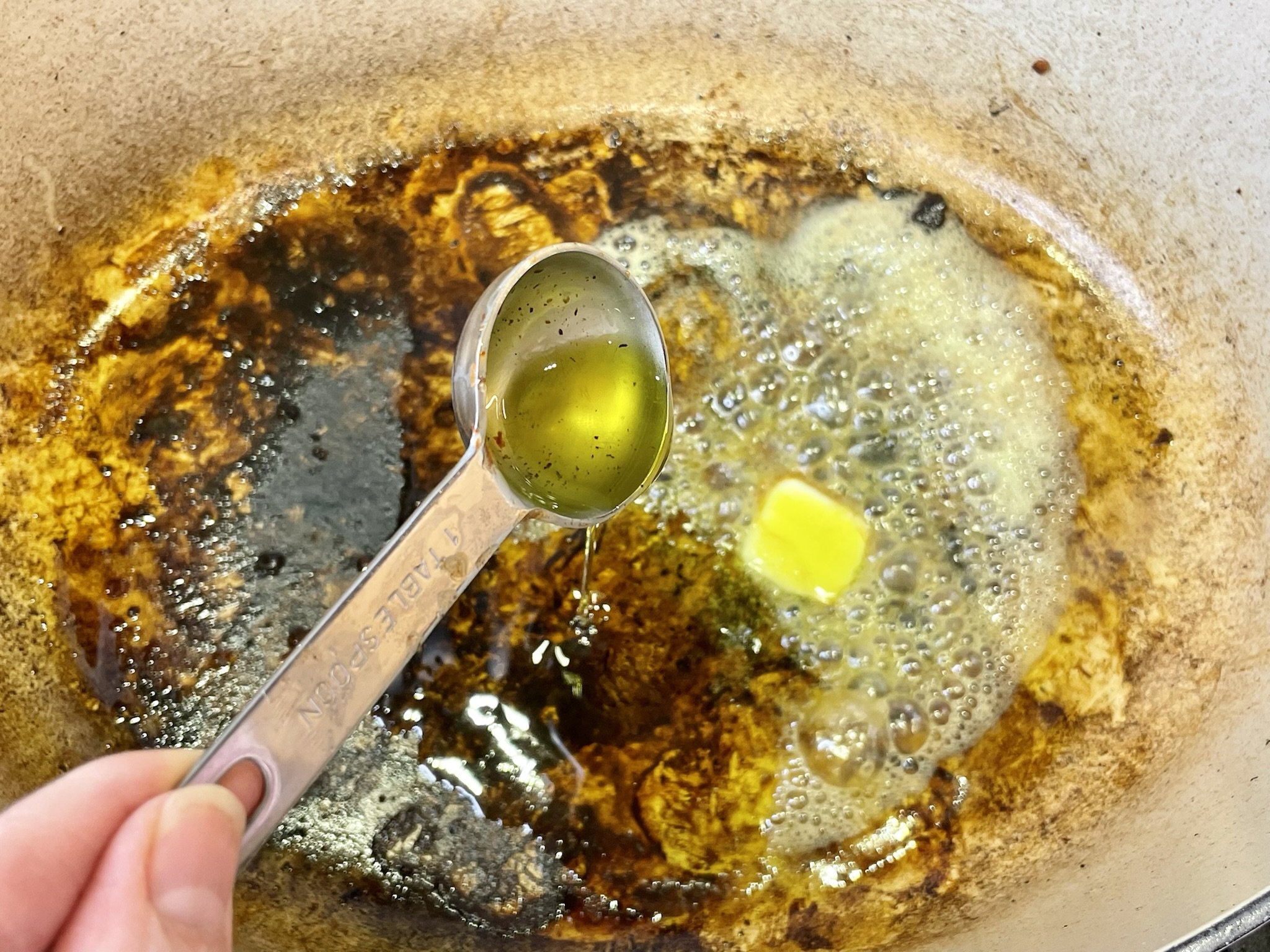 Melt butter &amp; olive oil.