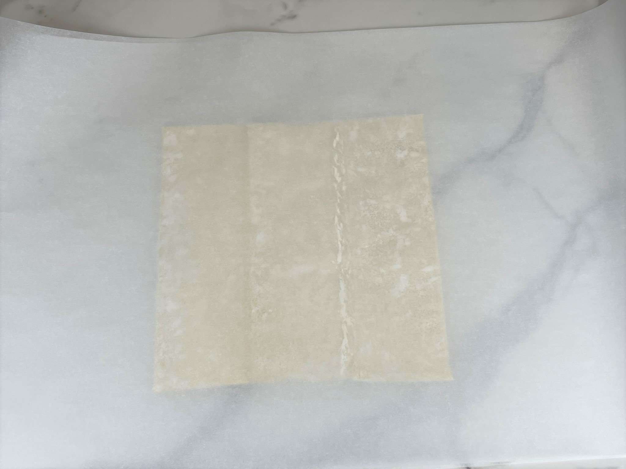 Parchment paper on top.
