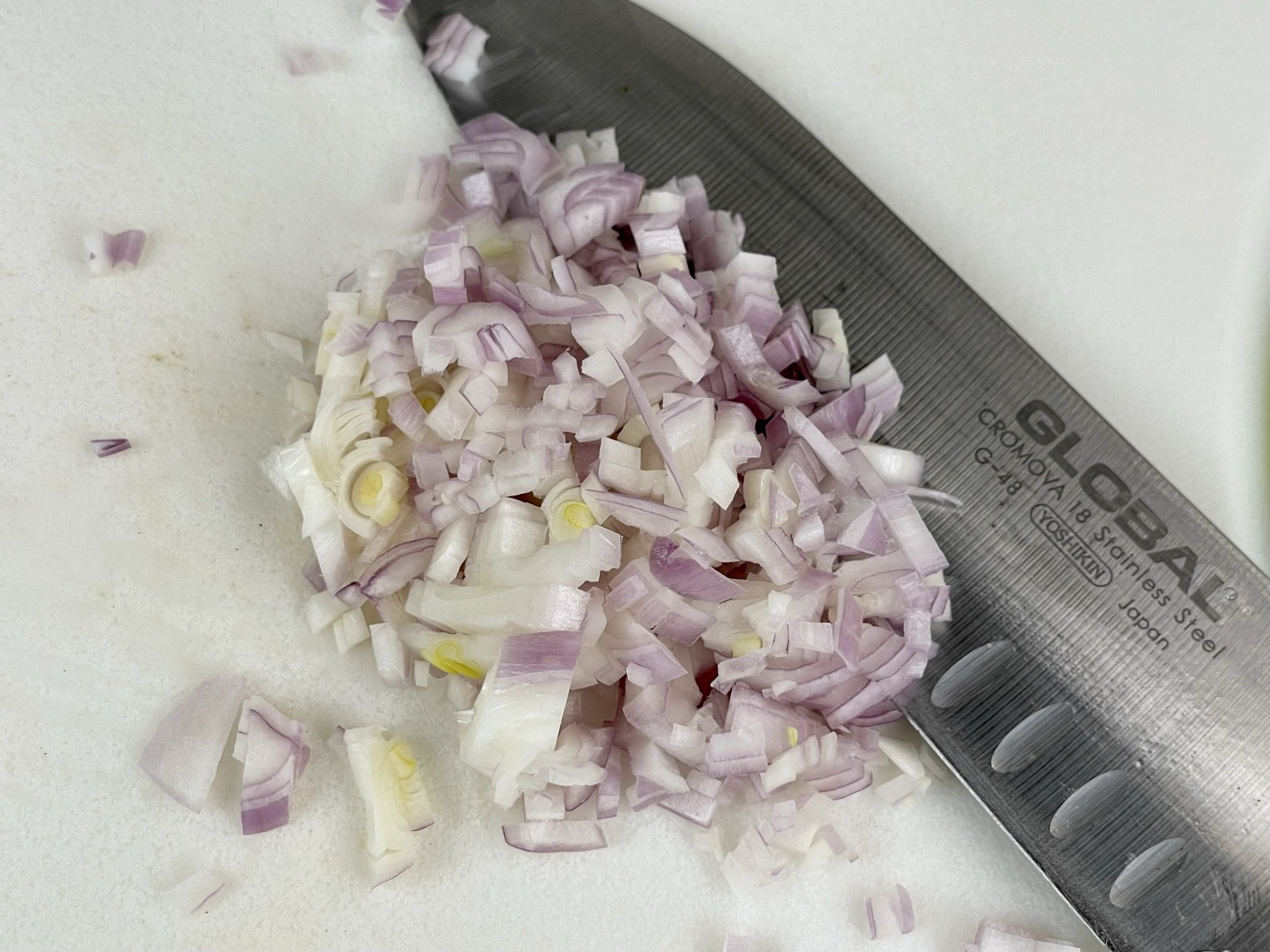 Finely chop shallots.