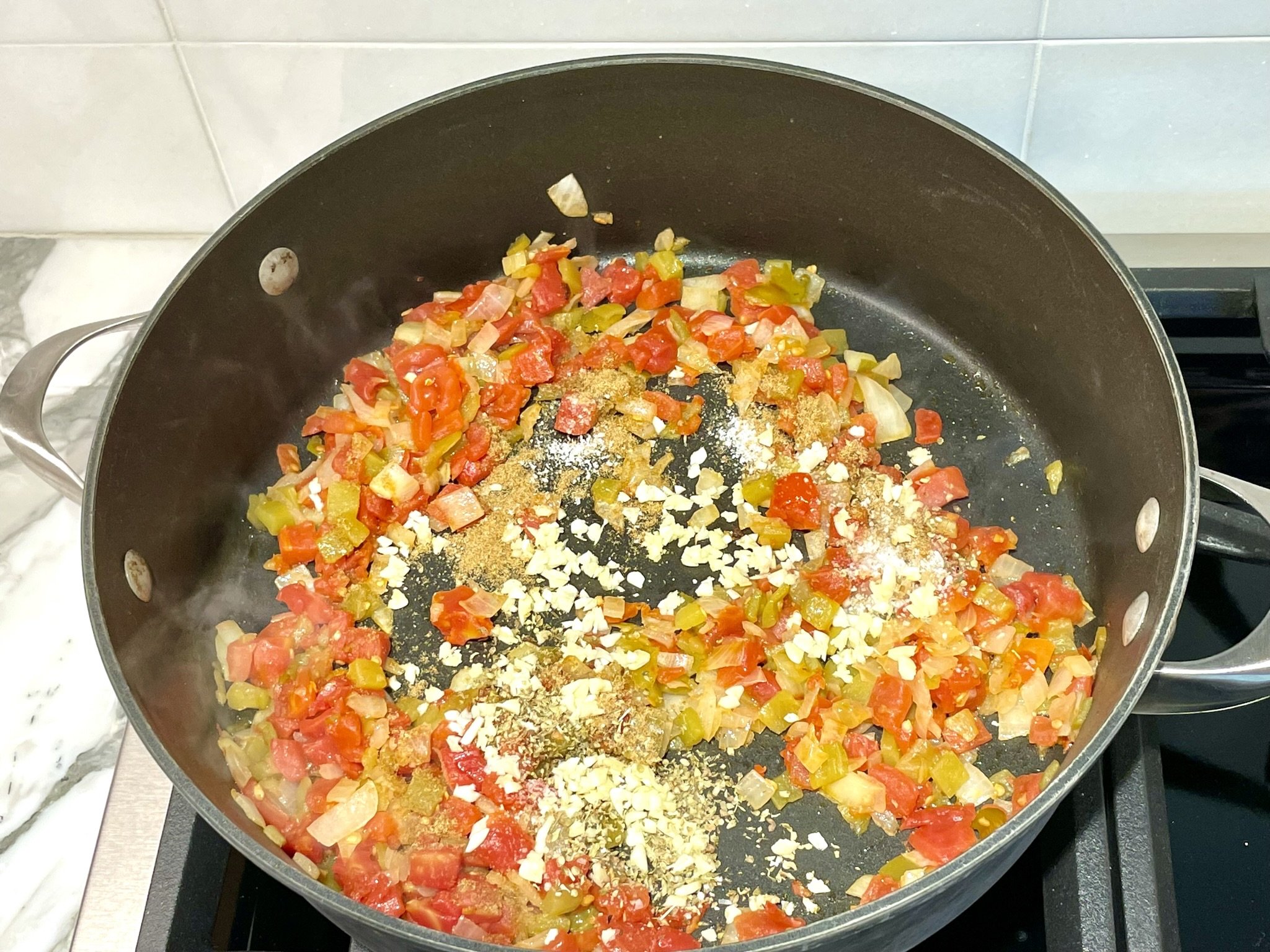 Add garlic &amp; spices.