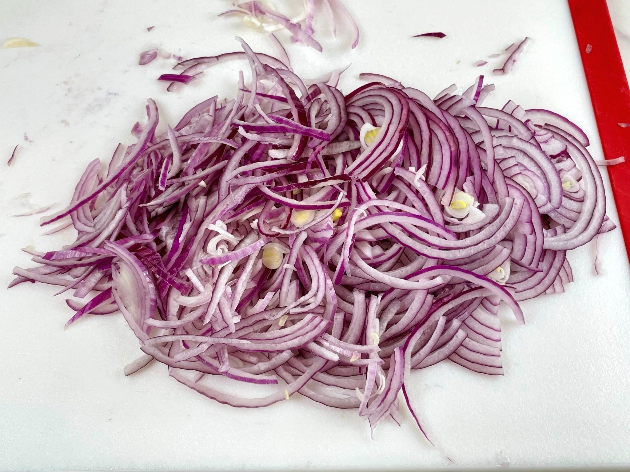 Thinly sliced onion.