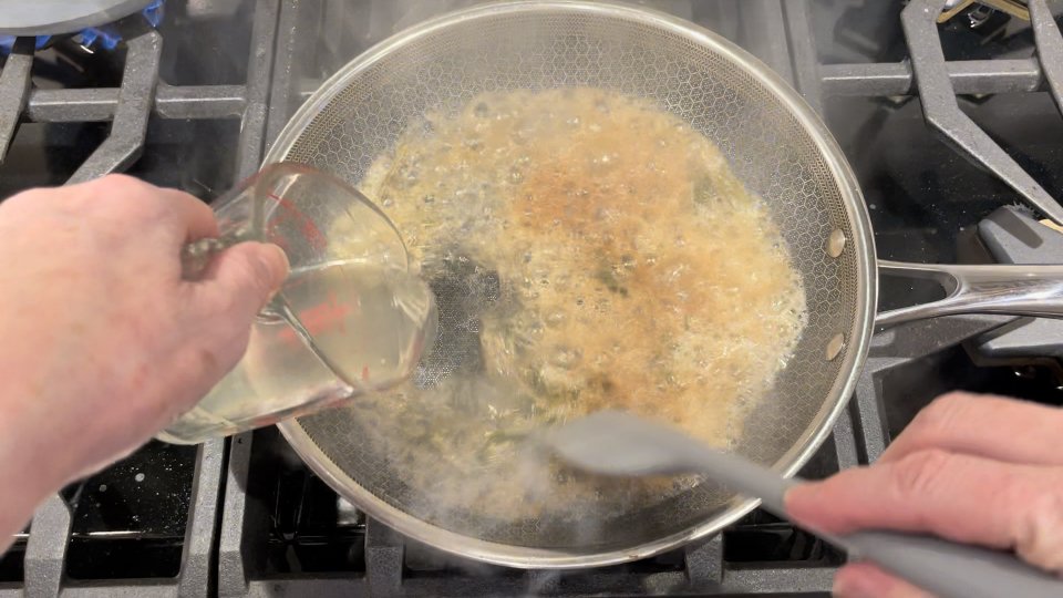 Add pasta water.